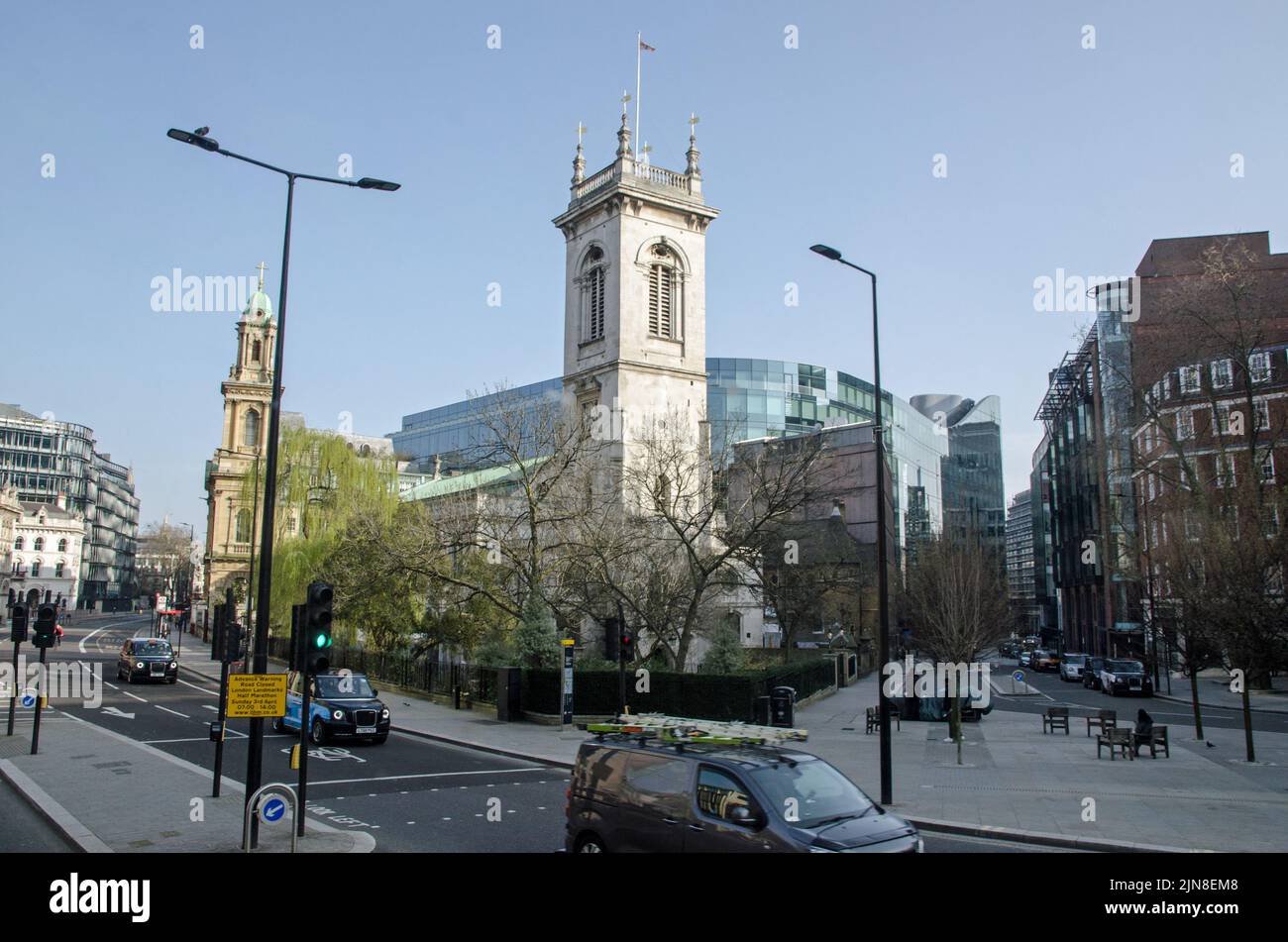 Slightly elevated view of the Church of St Andrew in Holborn, central London on a sunny Spring day.  Beyond the Christopher Wren designed church is th Stock Photo