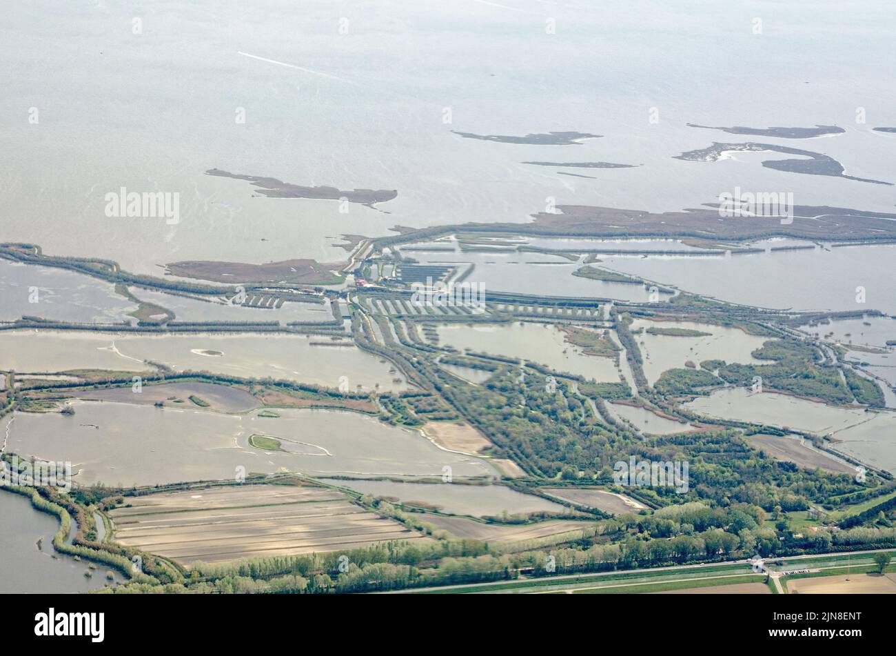 View from a plane of the marshy coastline of the Venetian Lagoon with the agricultural Valle Mille Campi area in Codevigo, Padua Province on a sunny m Stock Photo
