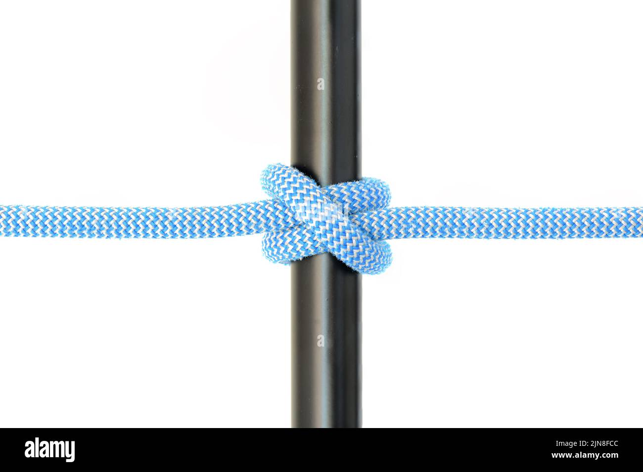 The clove hitch is a type of knot. Along with the bowline and the sheet bend, it is often considered one of the most important knots Stock Photo