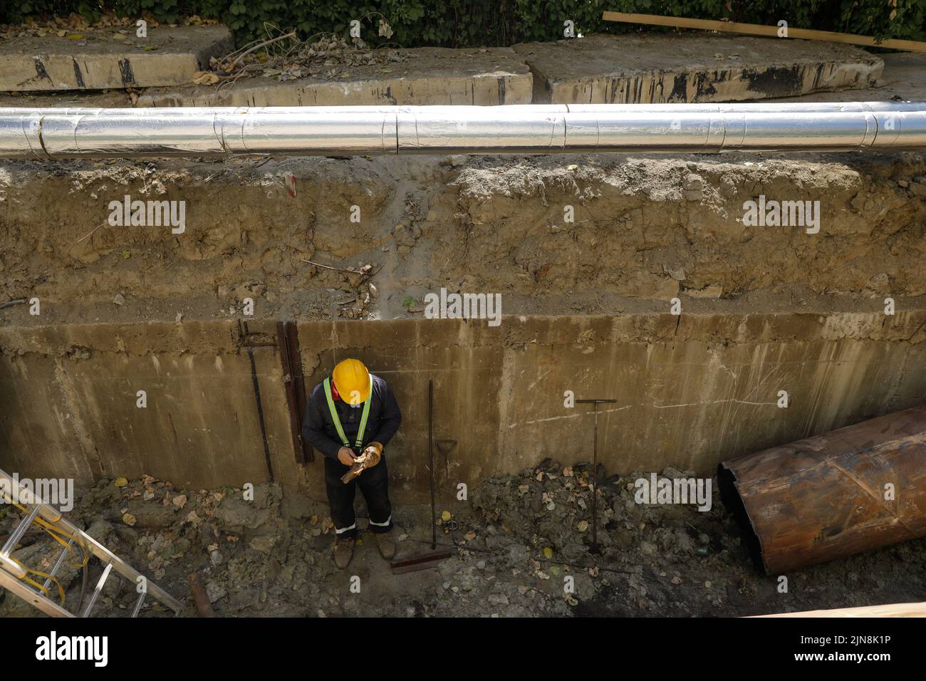 Bucharest, Romania - August 3, 2022: Construction worker on a construction site. Stock Photo