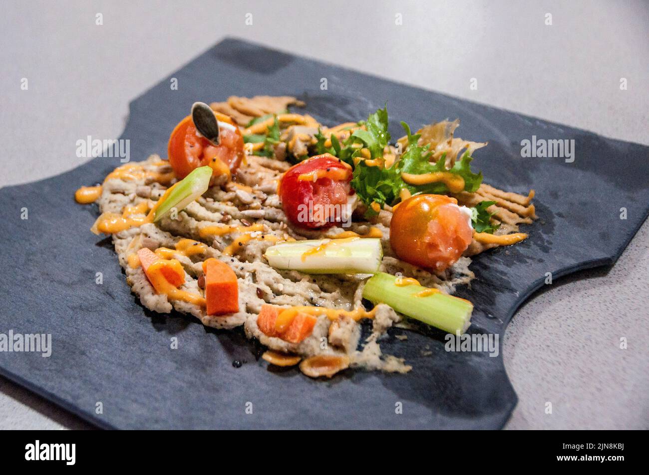 High cuisine dish served to diners Stock Photo Alamy