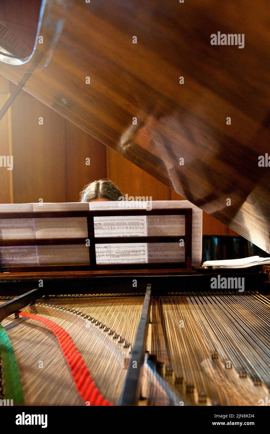 Ancient and famous grand piano for the elite of pianists Stock Photo