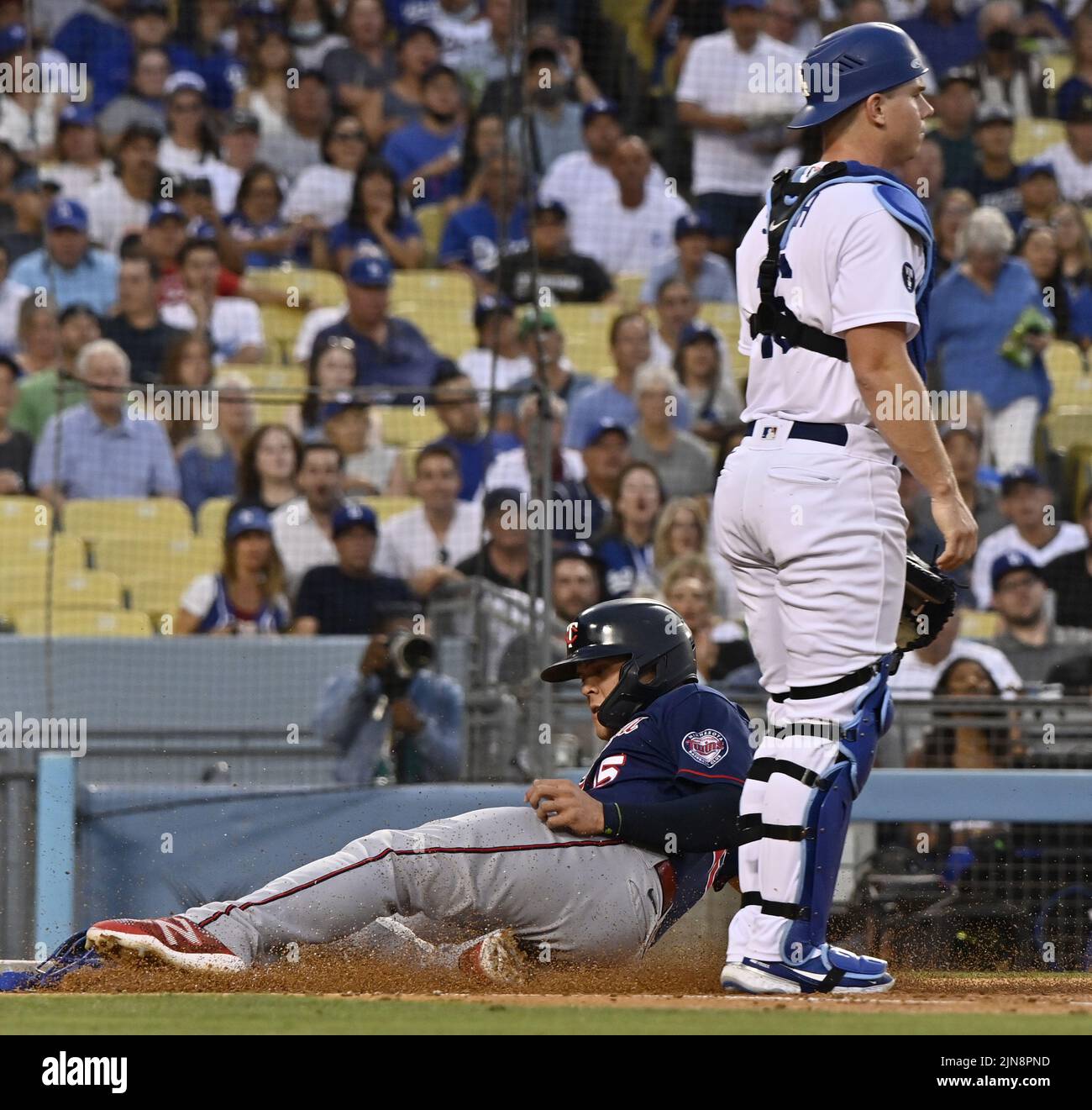Los Angeles, United States. 10th Aug, 2022. Minnesota Twins Gio Urshela, who hit a triple off Los Angeles Dodgers starting pitcher Julio Urias, scores from third on a slow roller up the third-base line during the second inning at Dodger Stadium on Tuesday, August 9, 2022. Photo by Jim Ruymen/UPI Credit: UPI/Alamy Live News Stock Photo
