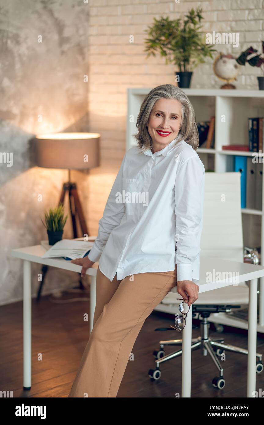 Contented well dressed hi-res stock photography and images - Alamy