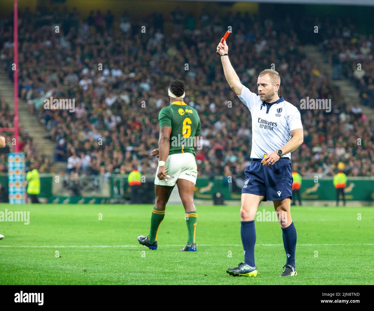 The referee awarding a Red Card to KurtLee Arendse for an illegal