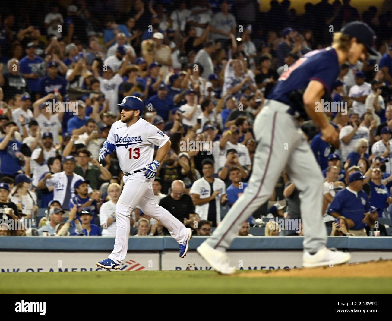 Los Angeles, United States. 10th Aug, 2022. Los Angeles Dodgers Max Muncy rounds the bases after hitting a solo home run to right center off Minnesota Twins starting pitcher Joe Ryan (R) during the fourth inning at Dodger Stadium on Tuesday, August 9, 2022. Photo by Jim Ruymen/UPI Credit: UPI/Alamy Live News Stock Photo