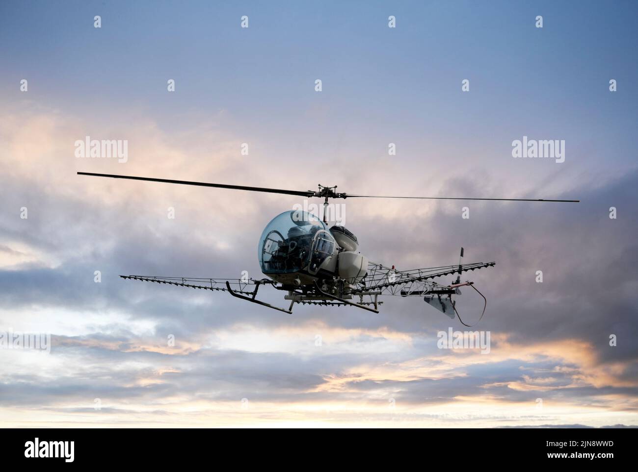 picture of a spreading plane in the sky Stock Photo