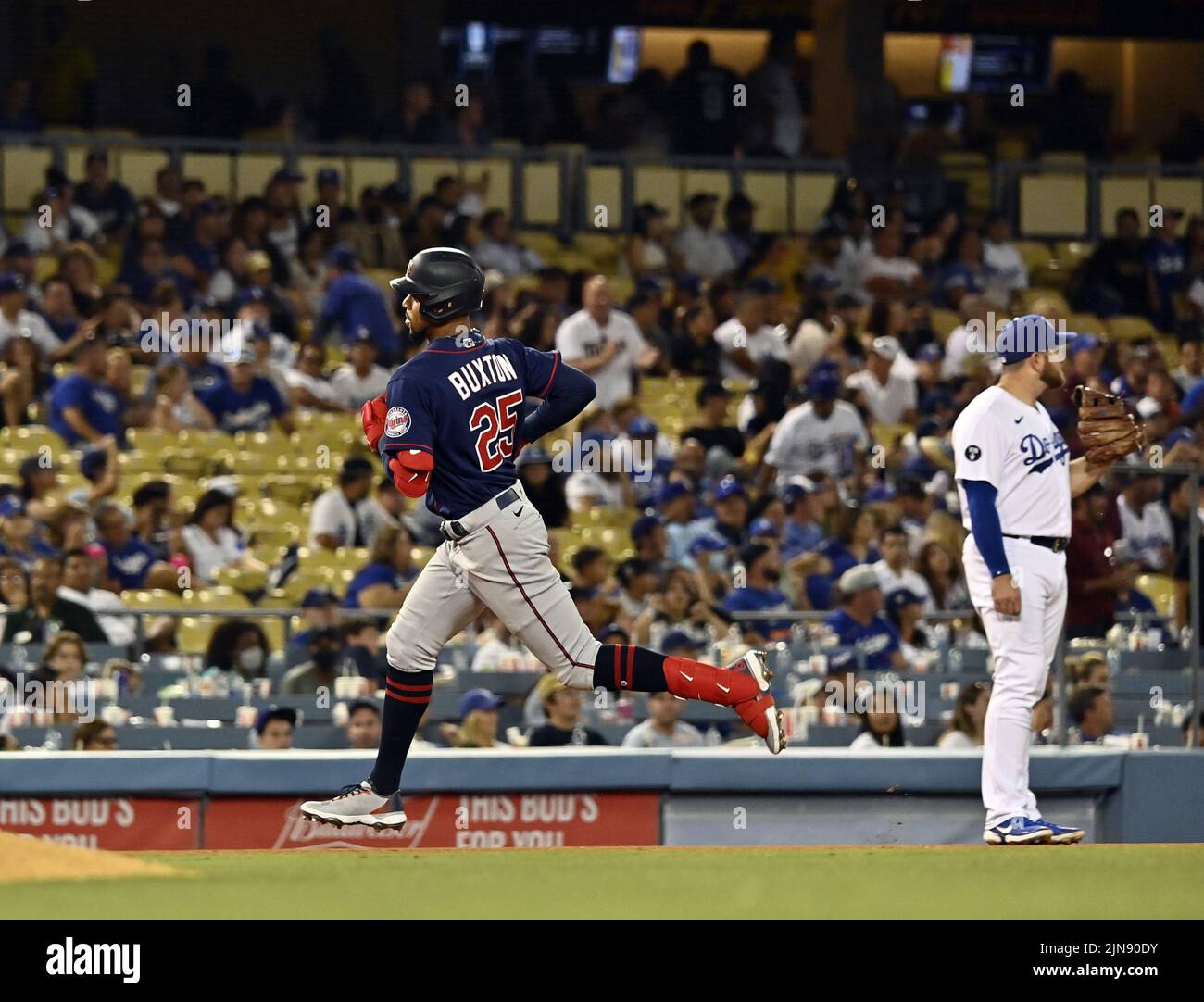 Los Angeles, United States. 10th Aug, 2022. Minnesota Twins Byron Buxton rounds the bases after hitting a two-RBI home run to center off Los Angeles relief pitcher Phil Bickford during the eighth inning at Dodger Stadium on Tuesday, August 9, 2022. The Dodgers defeated the Twins 10-3 for their ninth consecutive win. Photo by Jim Ruymen/UPI Credit: UPI/Alamy Live News Stock Photo