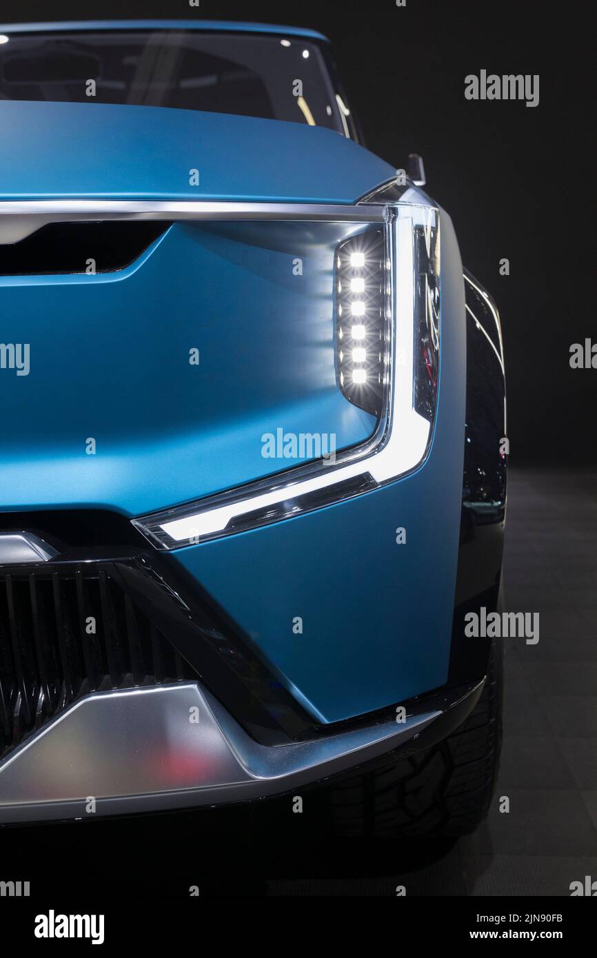 A vertical shot of Kia's luxury blue electric vehicle EV9 concept and