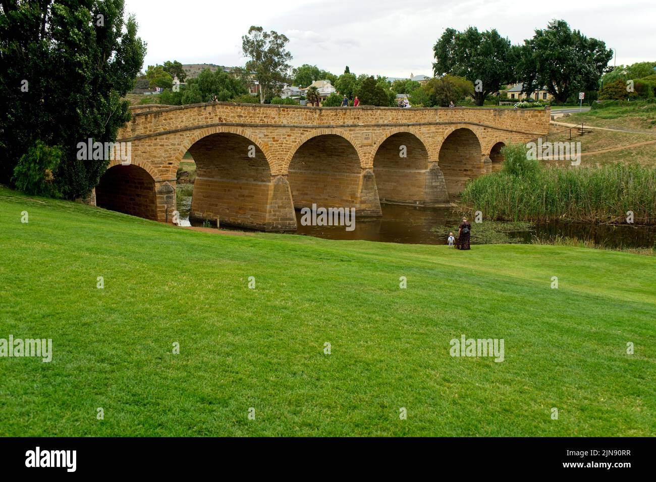 A scenic view of the Richmond Bridge in a green park in Tasmania Stock Photo