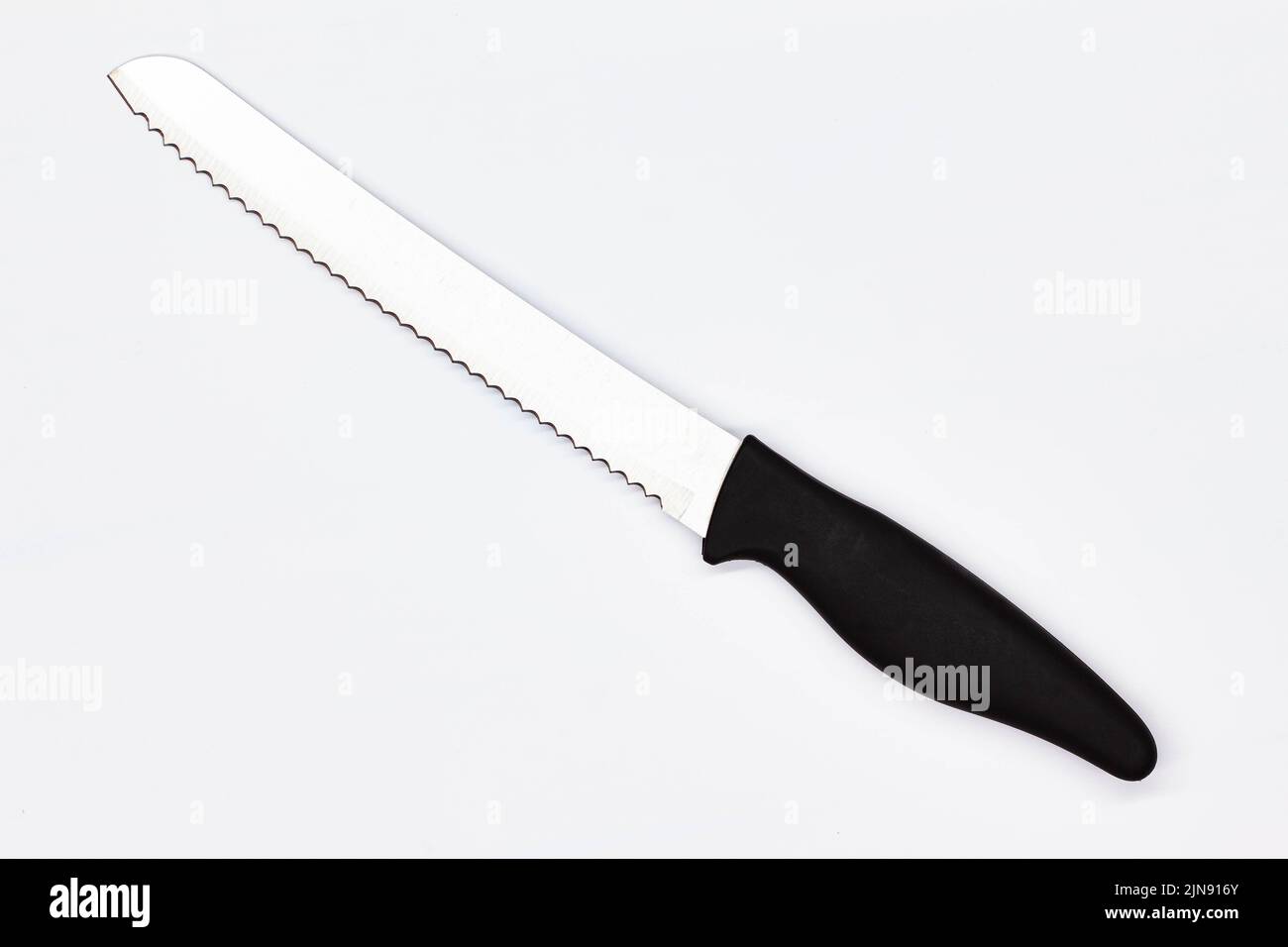 https://c8.alamy.com/comp/2JN916Y/kitchen-knife-for-bread-on-white-background-chef-butchers-knife-for-cutting-bread-knife-for-cutting-bakery-products-kitchenware-professional-food-2JN916Y.jpg