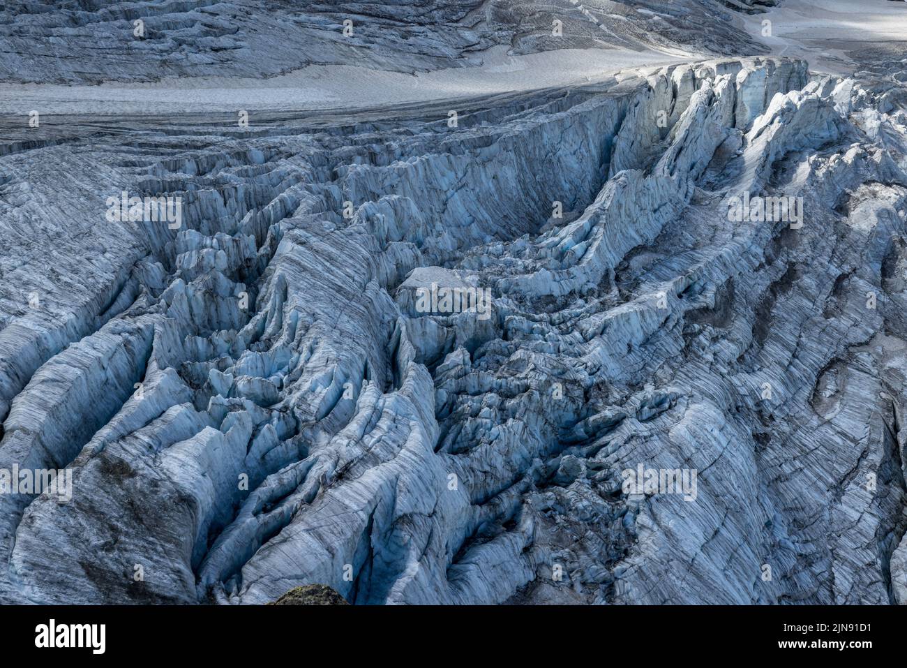 structure of ice crevasses on Steingletscher in the Bernese Alps Stock Photo