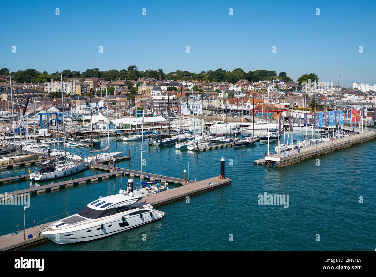 General view of west Cowes, including the marina and yacht haven, on the Isle of Wight on a sunny day. Stock Photo