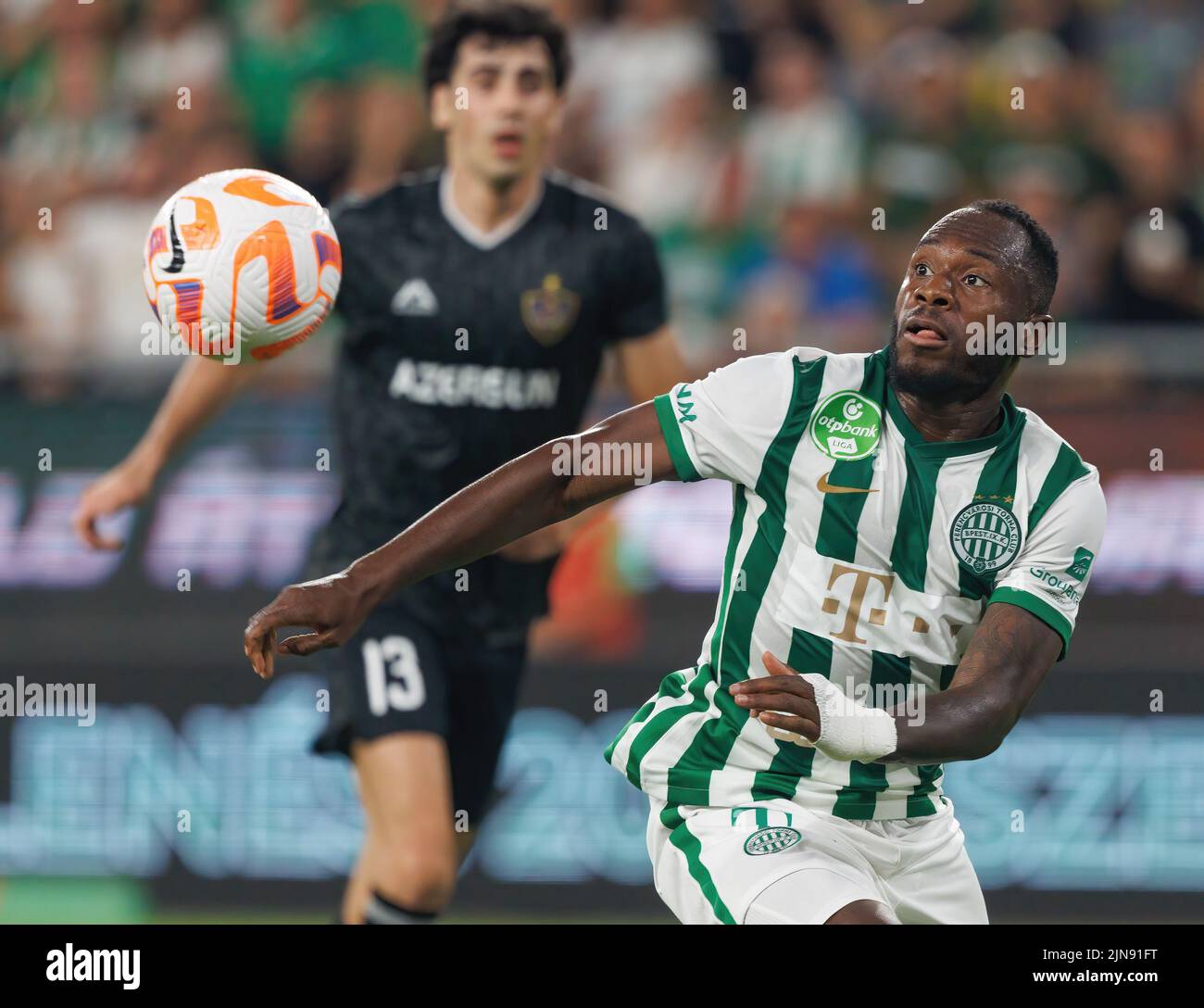 BUDAPEST, HUNGARY - AUGUST 9: Gara Garayev of Qarabag FK fouls Aissa  Laidouni of Ferencvarosi TC during the UEFA Champions League Qualifying  Round match between Ferencvarosi TC and Qarabag FK at Ferencvaros