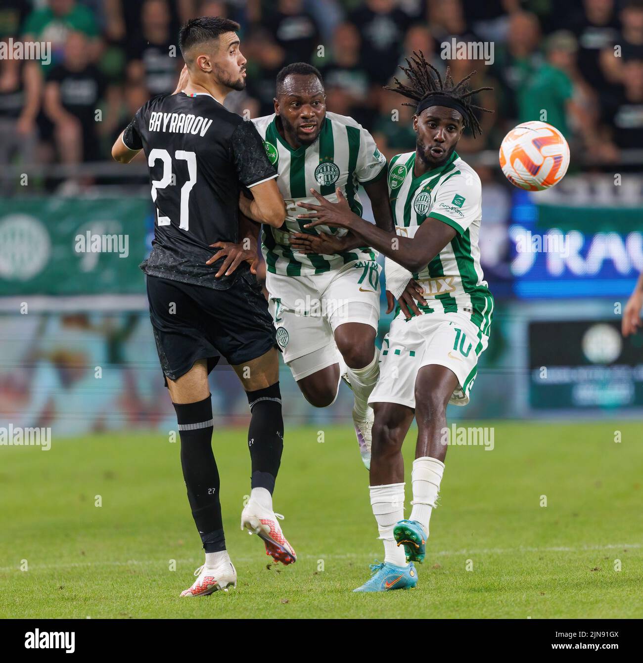 BUDAPEST, HUNGARY - AUGUST 9: Gara Garayev of Qarabag FK fouls Aissa  Laidouni of Ferencvarosi TC during the UEFA Champions League Qualifying  Round match between Ferencvarosi TC and Qarabag FK at Ferencvaros