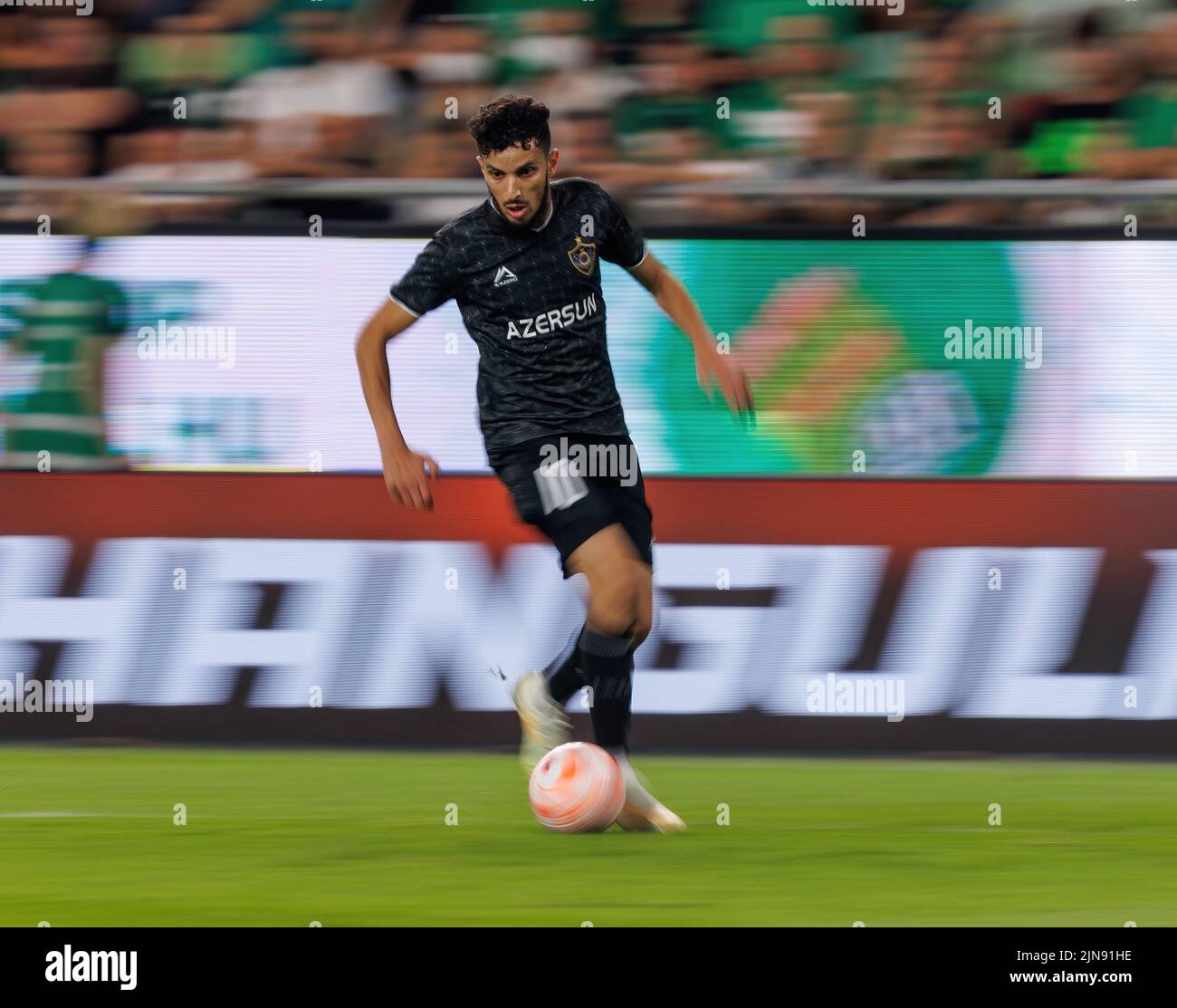 BUDAPEST, HUNGARY - AUGUST 9: Adama Traore of Ferencvarosi TC controls the  ball during the UEFA Champions League Qualifying Round match between Ferencvarosi  TC and Qarabag FK at Ferencvaros Stadium on August