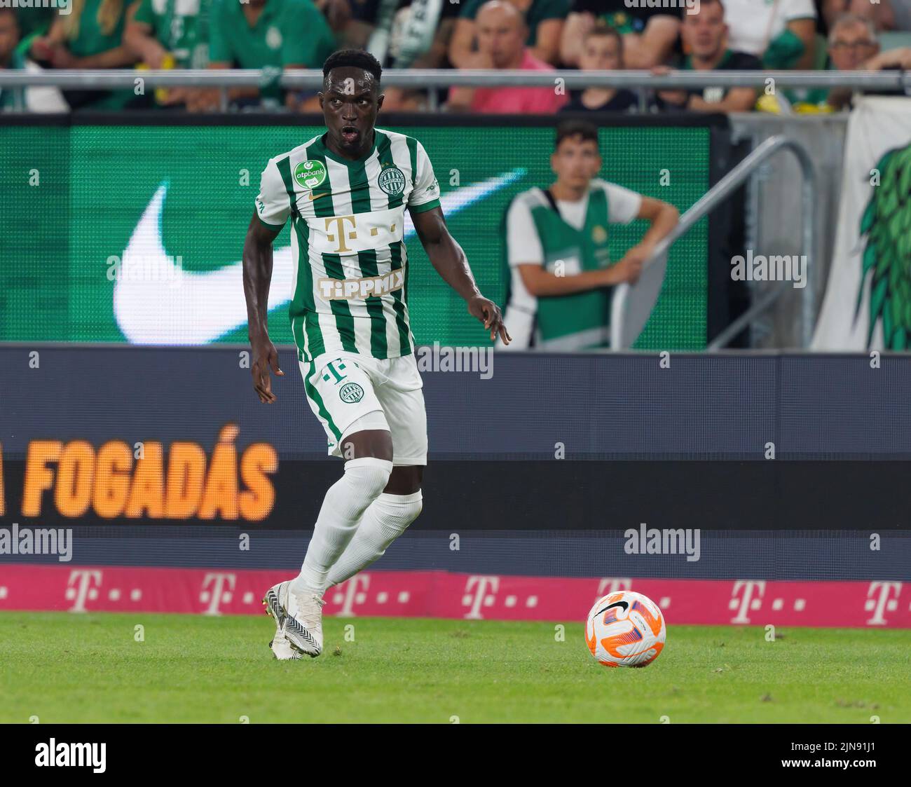 BUDAPEST, HUNGARY - AUGUST 9: Adama Traore of Ferencvarosi TC controls the  ball during the UEFA Champions League Qualifying Round match between Ferencvarosi  TC and Qarabag FK at Ferencvaros Stadium on August