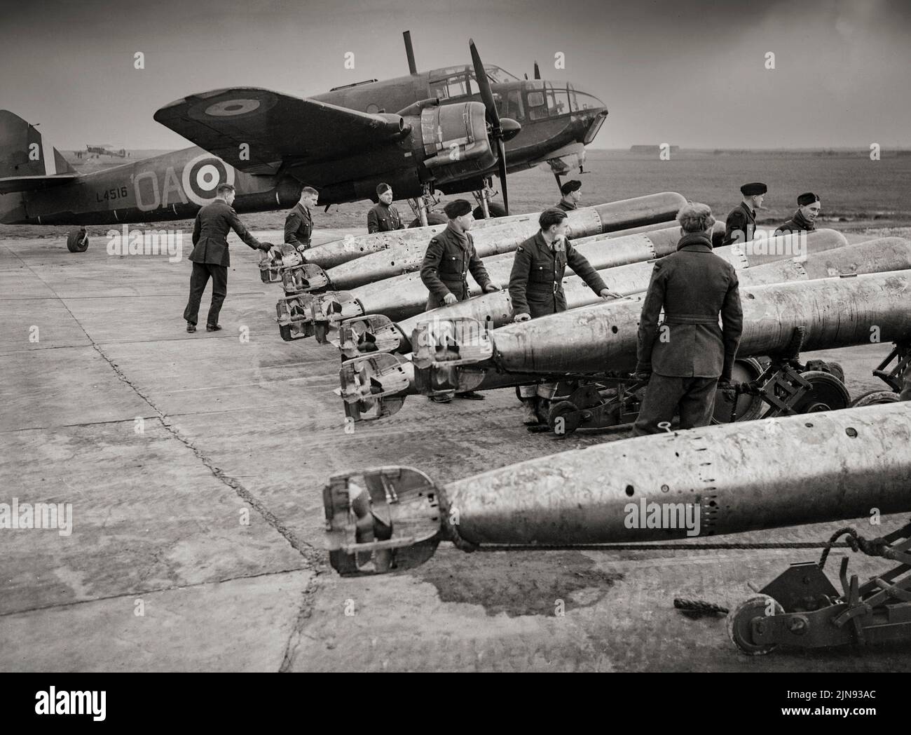 A Bristol Beaufort of No 22 Squadron with an array of torpedoes at RAF North Coates in Lincolnshire, England, operated by Coastal Command. The Bristol Beaufort was a British twin-engined torpedo bomber that first saw service with Royal Air Force Coastal Command and then the Royal Navy Fleet Air Arm from 1940. It was used as torpedo bomber, conventional bomber and mine-layer until 1942, when it was removed from active service.ANT Stock Photo
