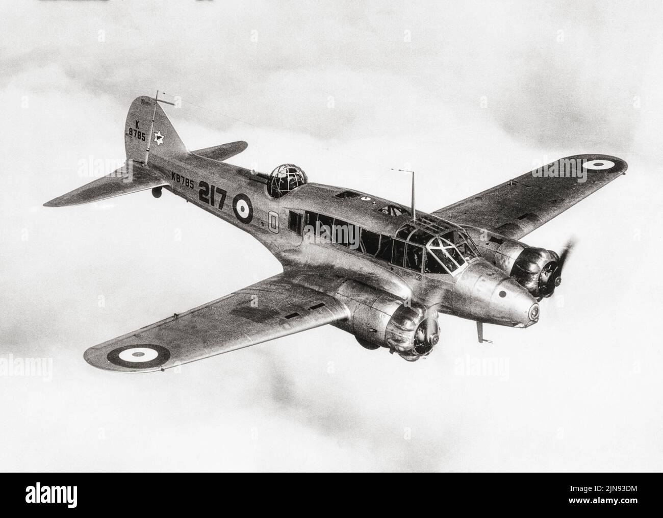Avro Anson Mark 1  No.217 Squadron, in flight  in  1937. A British twin-engined, multi-role aircraft it went on to serve in a variety of roles for the Royal Air Force (RAF), Fleet Air Arm (FAA), Royal Canadian Air Force (RCAF) and numerous other air forces before, during, and after the Second World War. Stock Photo