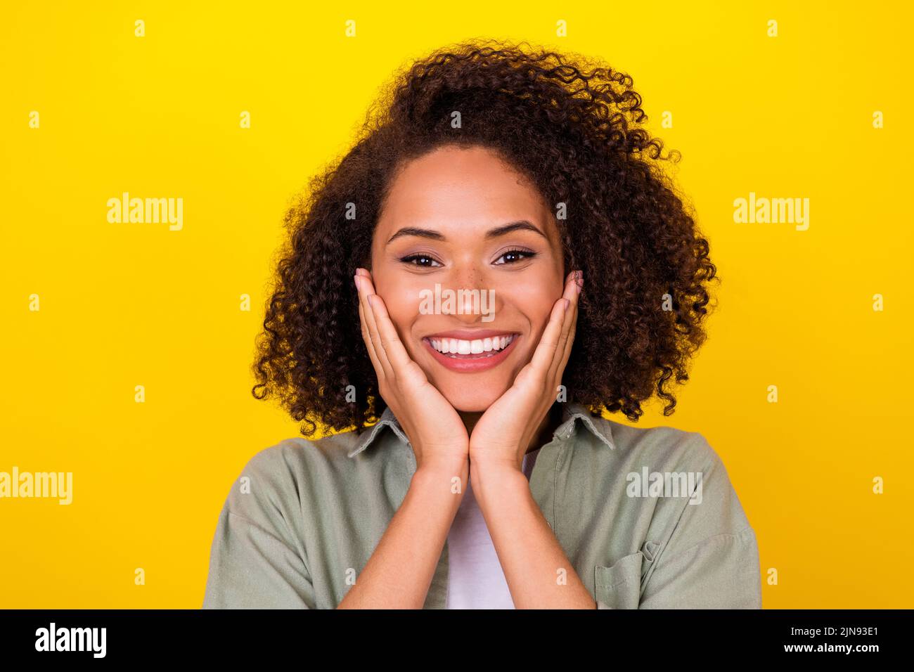 Portrait of positive pretty lady beaming hollywood smiling with white clean teeth isolated bright color background Stock Photo