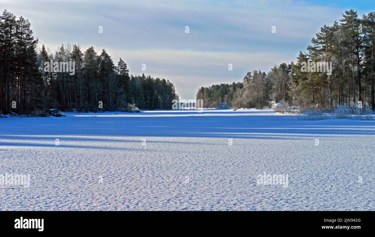Corridor of islands on South Kallavesi lake south of Savolanniemi cape, Kuopio, Finland, 2017-03-19 08:11 +02. Stock Photo