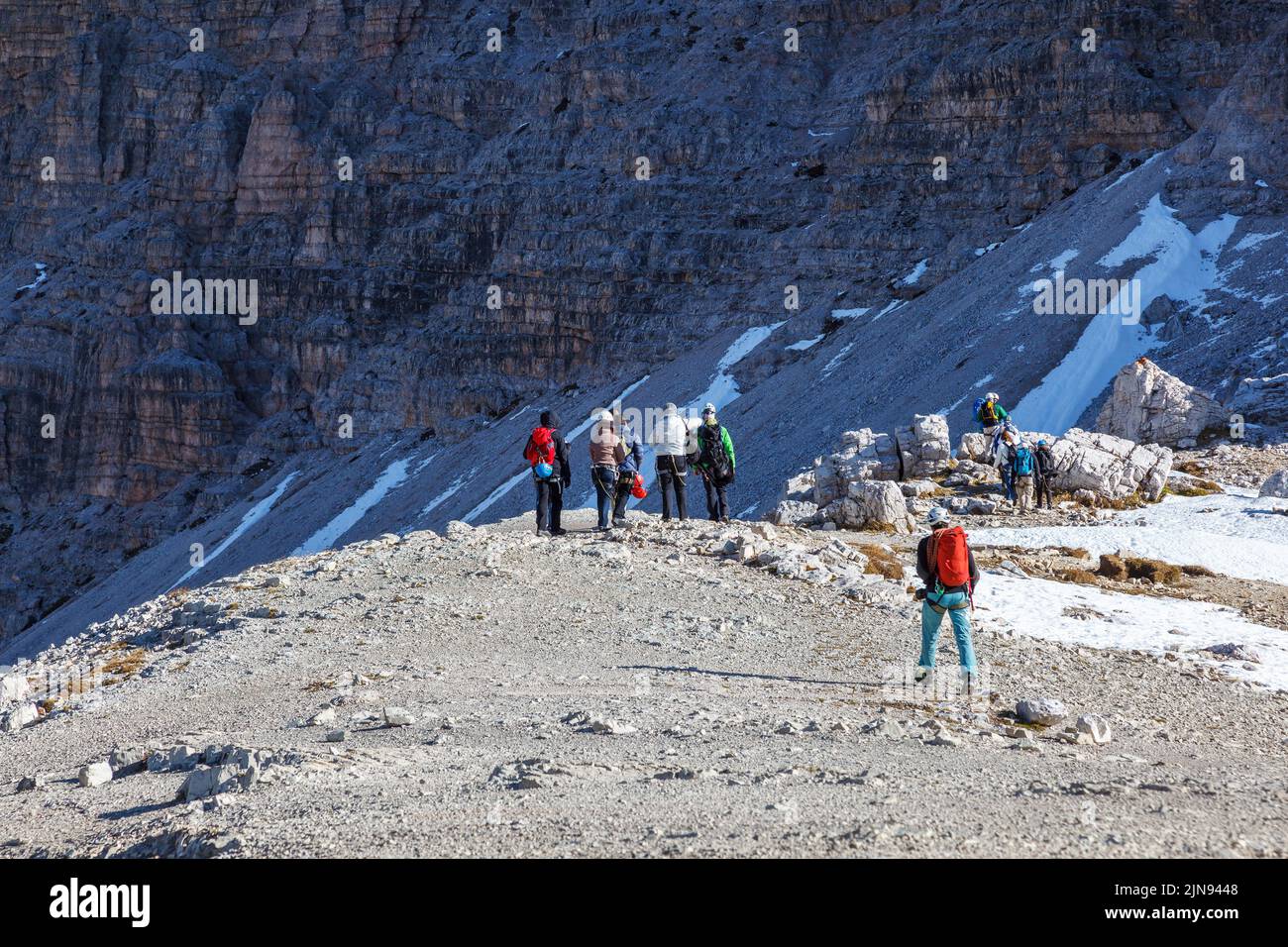 Hikers in the Dolomites mountains Stock Photo - Alamy