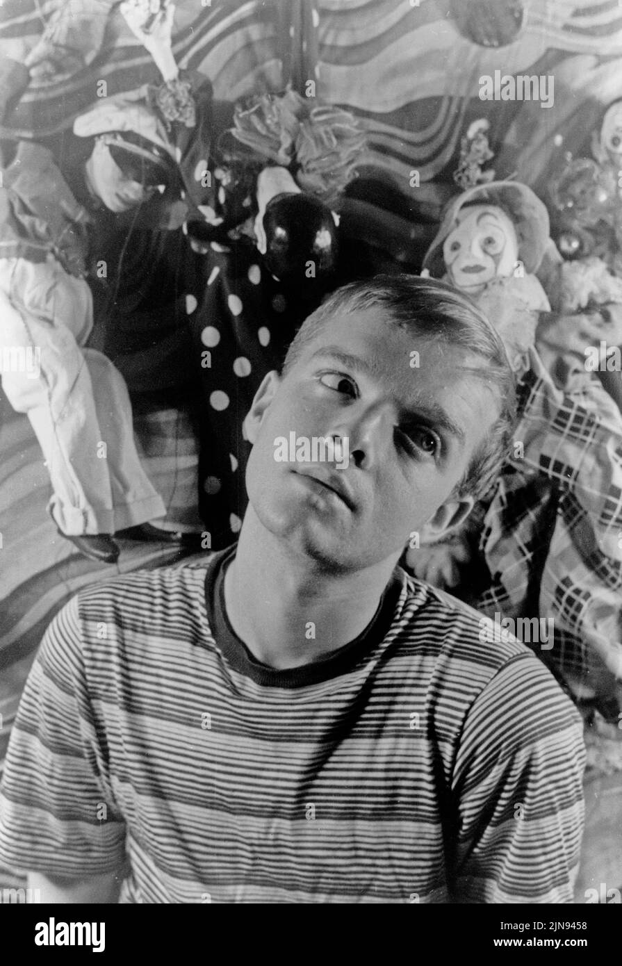 USA - 30 March 1948 - Studio portrait of Truman Capote ( 1924-1984 ) with puppets in the background -- Picture by Carl Van Vechten/Geopix Stock Photo