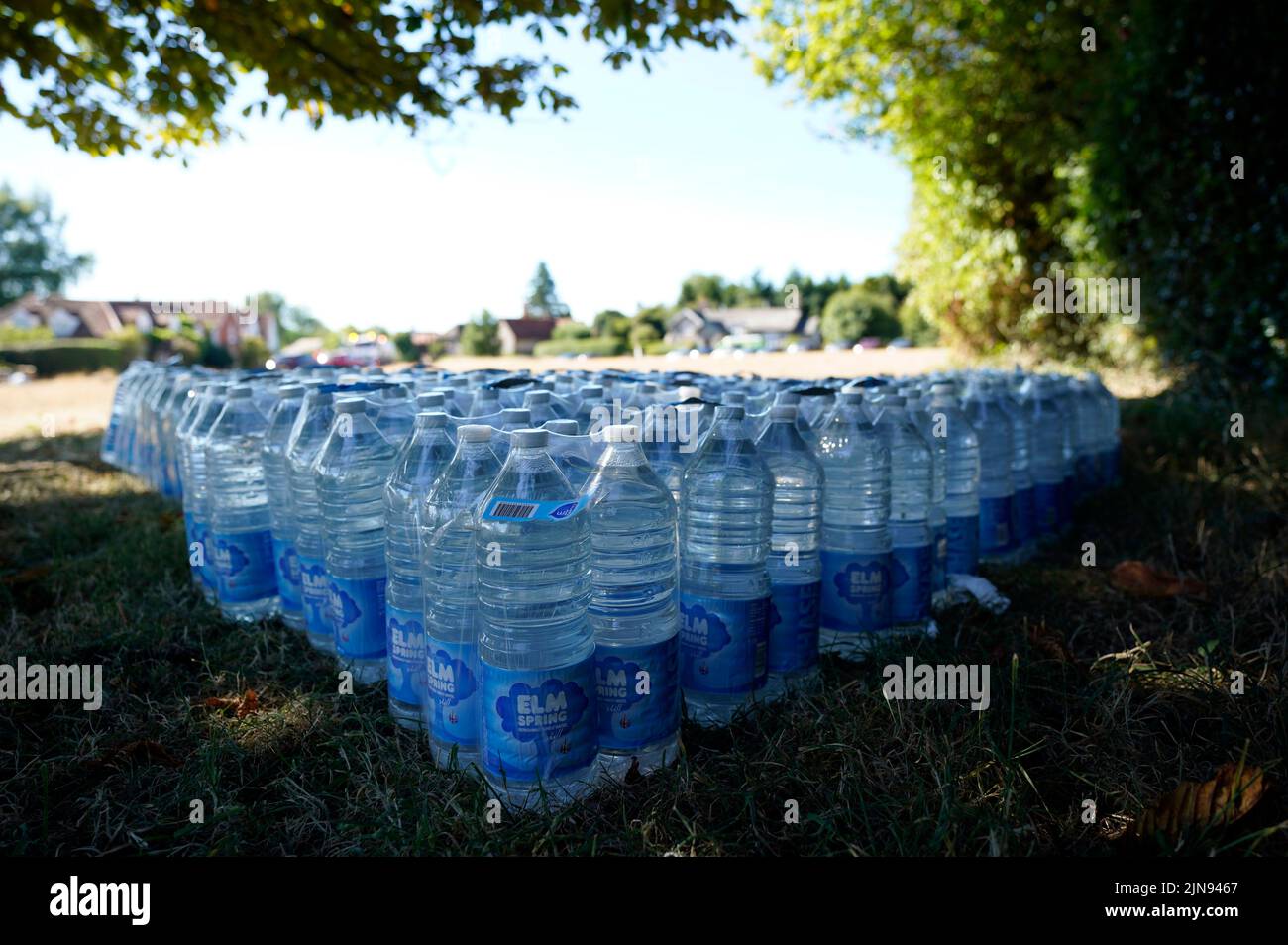 Bottles of water supplied by Thames Water for residents of the village of Northend in Oxfordshire, where the water company is pumping water into the supply network following a technical issue at Stokenchurch Reservoir. The Met Office has issued an amber warning for extreme heat covering four days from Thursday to Sunday for parts of England and Wales as a new heatwave looms. Picture date: Wednesday August 10, 2022. Stock Photo