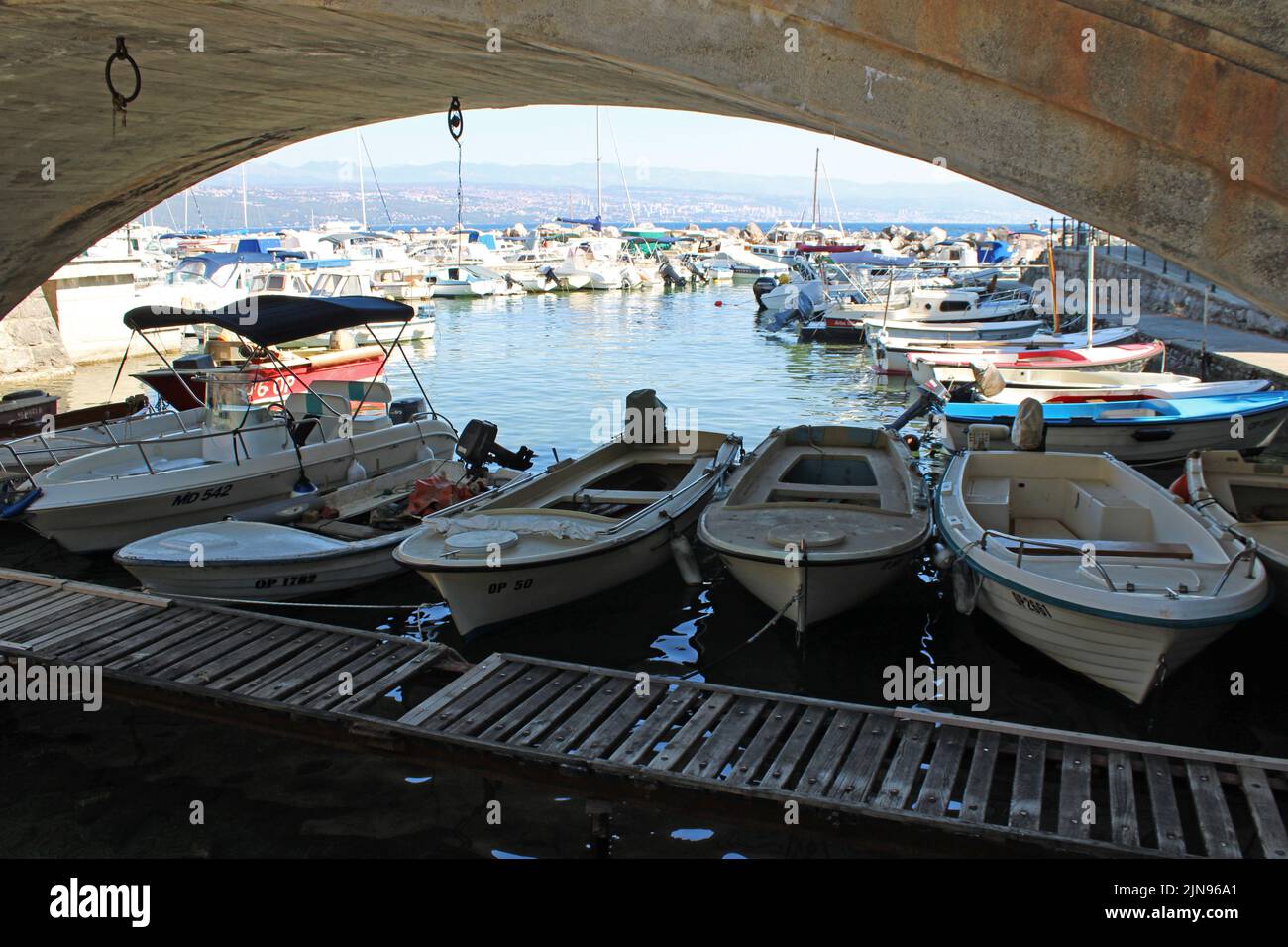 Famous landmarks, view from Ika's seaside promenade, central harbor vault, Adriatic coast, Kvarner bay, city details, Croatia Stock Photo