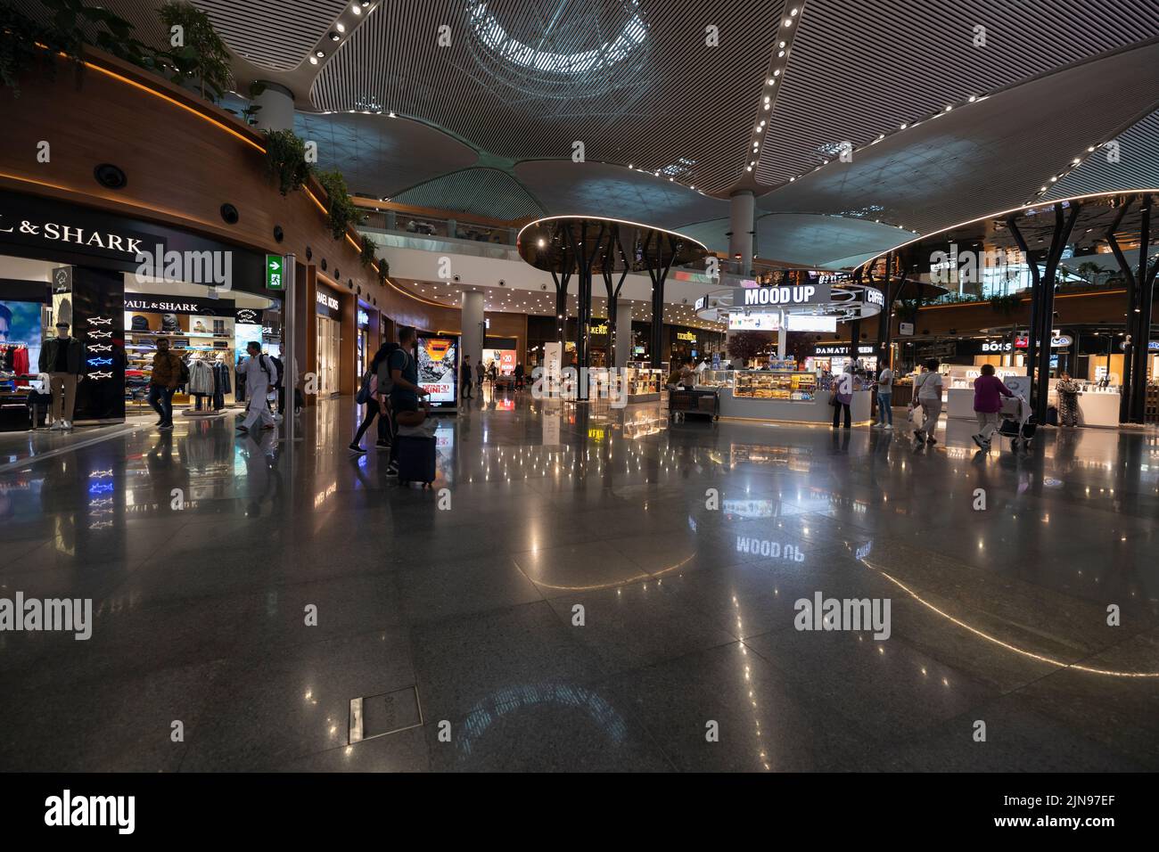 An inside shot of a modern Istanbul Airport with gorgeous architecture and great shopping opportunities Stock Photo