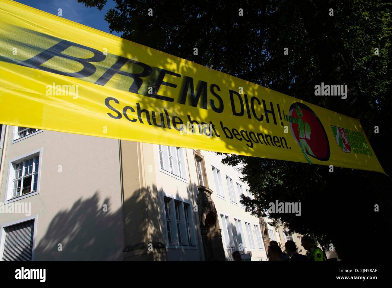 Poster 'Brake yourself', in front of the school building of the Anne-Frank Elementary School, Dorothee FELLER, CDU, Minister for Schools and Education of the State of North Rhine-Westphalia, presents the campaign 'Brake yourself! School has started, before, Ratingen on 08/10/2022 ©SVEN SIMON Fotoagentur GmbH & Co. Pressefoto KG # Prinzess-Luise-Str. 41 # 45479 M uelheim / R uhr # Tel. 0208/9413250 # Fax. 0208/9413260 # GLS Bank # BLZ 430 609 67 # Account 4030 025 100 # IBAN DE75 4306 0967 4030 0251 00 # BIC GENODEM1GLS # www.svensimon.net. Stock Photo