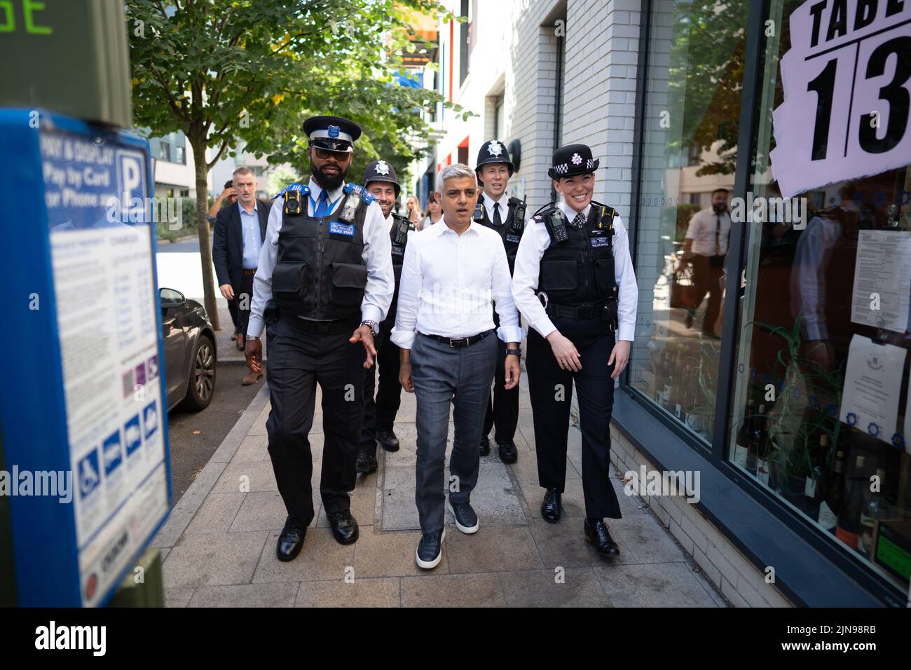 Mayor of London Sadiq Khan during a visit to Tottenham Hale Village, north London, where he was joined by a neighbourhood policing team on patrol and visiting Eagle Heights youth centre, which is funded by the Mayor's Violence Reduction Unit. Picture date: Wednesday August 10, 2022. Stock Photo
