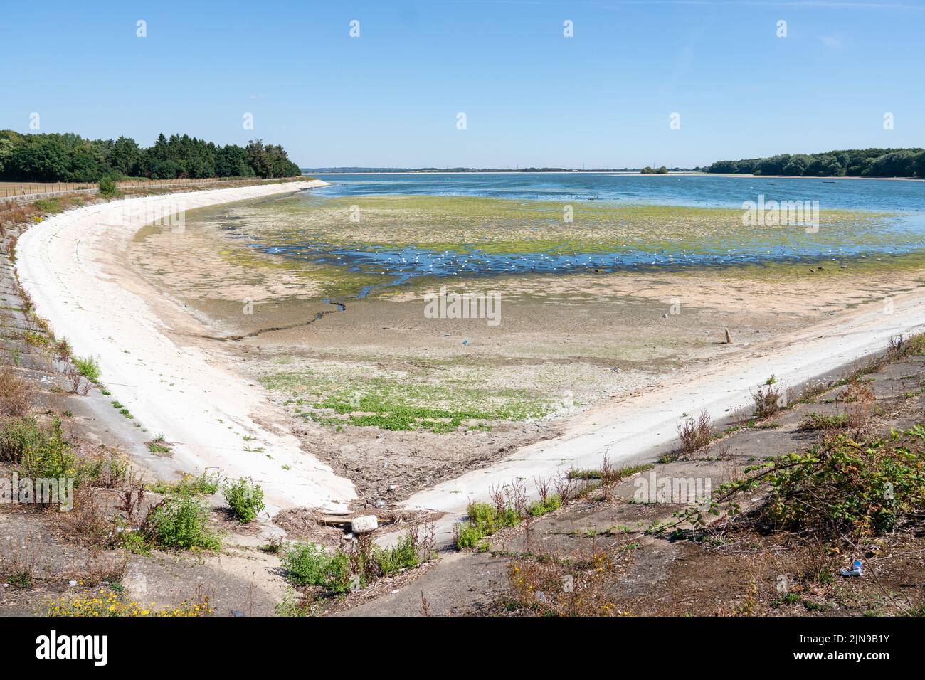 Reduced water levels at Hanningfield Reservoir, in Essex. The Met Office has issued an amber warning for extreme heat covering four days from Thursday to Sunday for parts of England and Wales as a new heatwave looms. Picture date: Wednesday August 10, 2022. Stock Photo