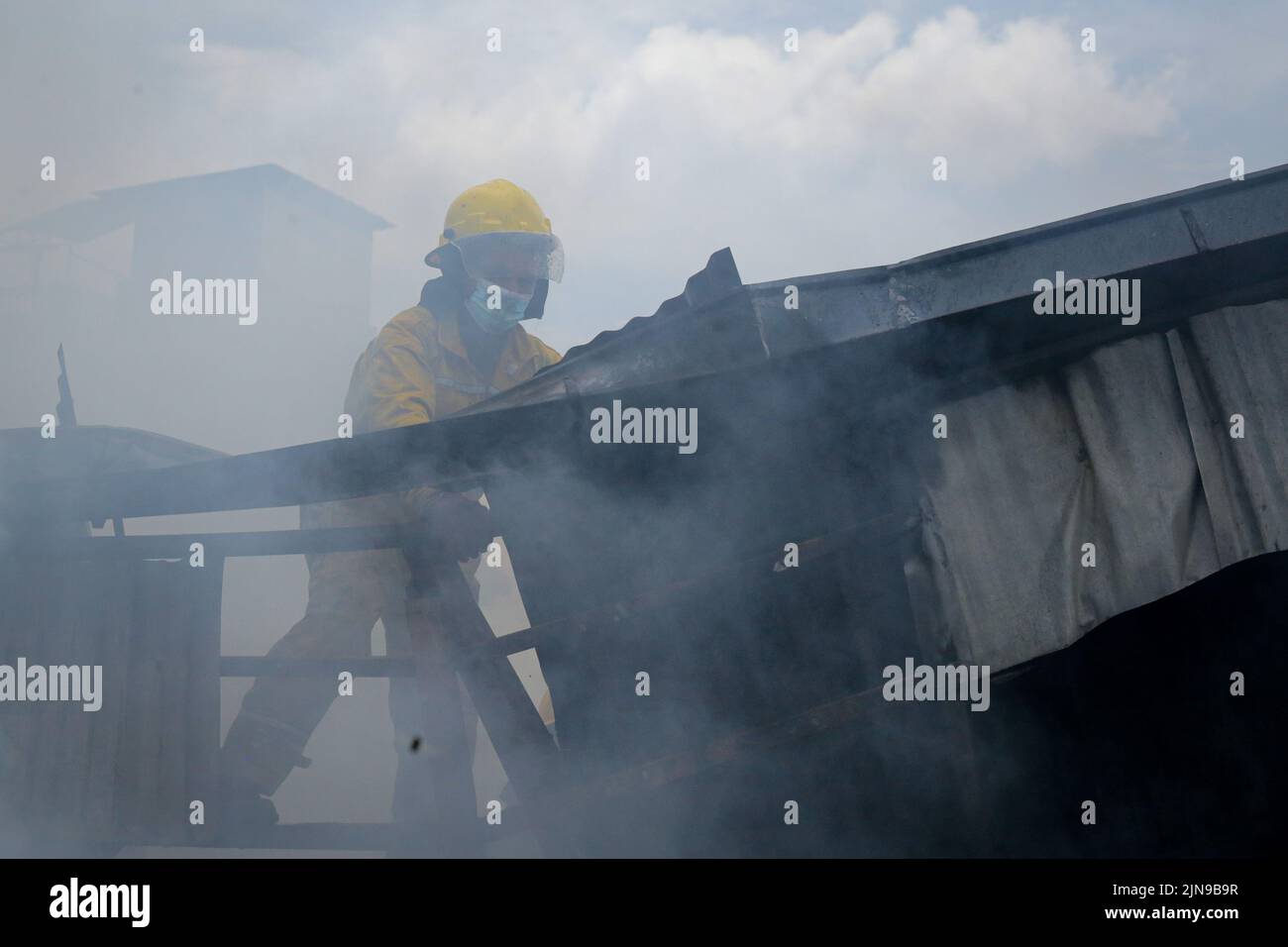 On August 10, 2022 in Kathmandu, Nepal. Firefighters with the help of