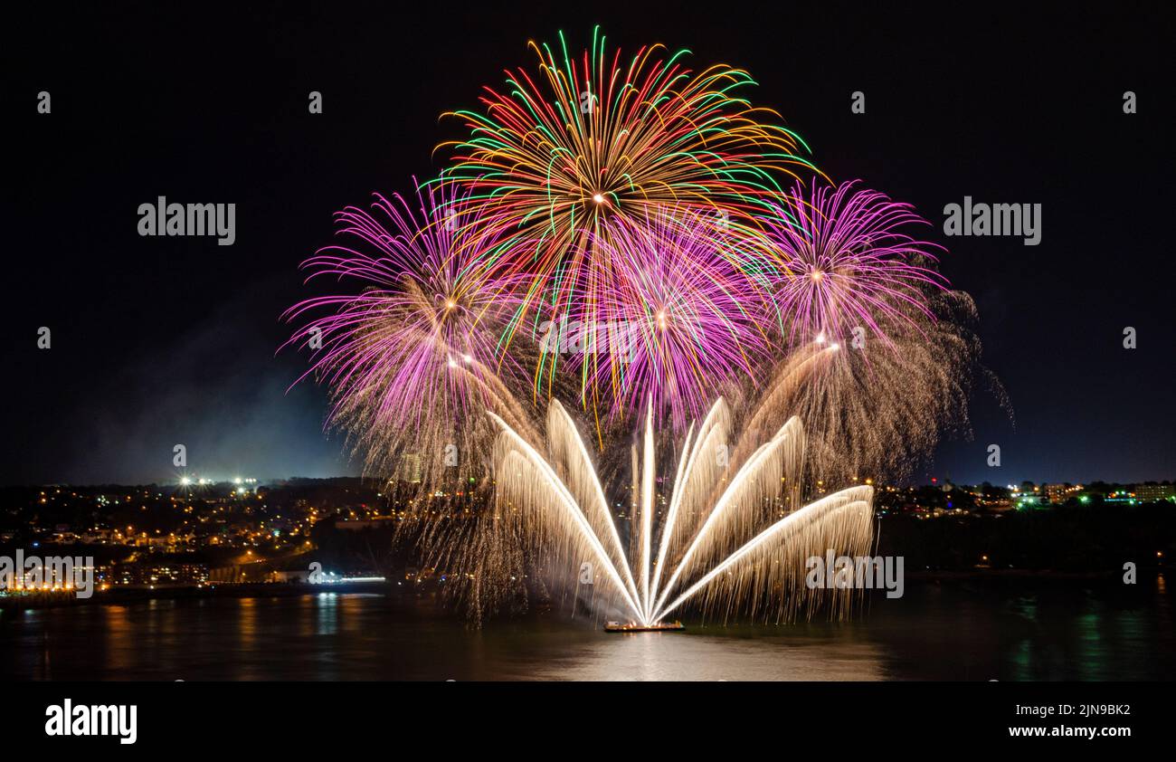 The colorful fireworks on the St Lawrence River, in Quebec City Stock