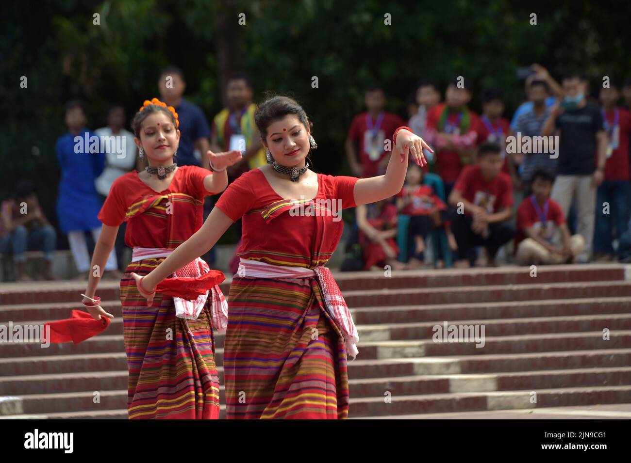 Dhaka. 10th Aug, 2022. People dance to celebrate the International Day of the World's Indigenous Peoples in Dhaka, Bangladesh, Aug. 9, 2022. The International Day of the World's Indigenous Peoples is marked every year on Aug. 9. Credit: Xinhua/Alamy Live News Stock Photo