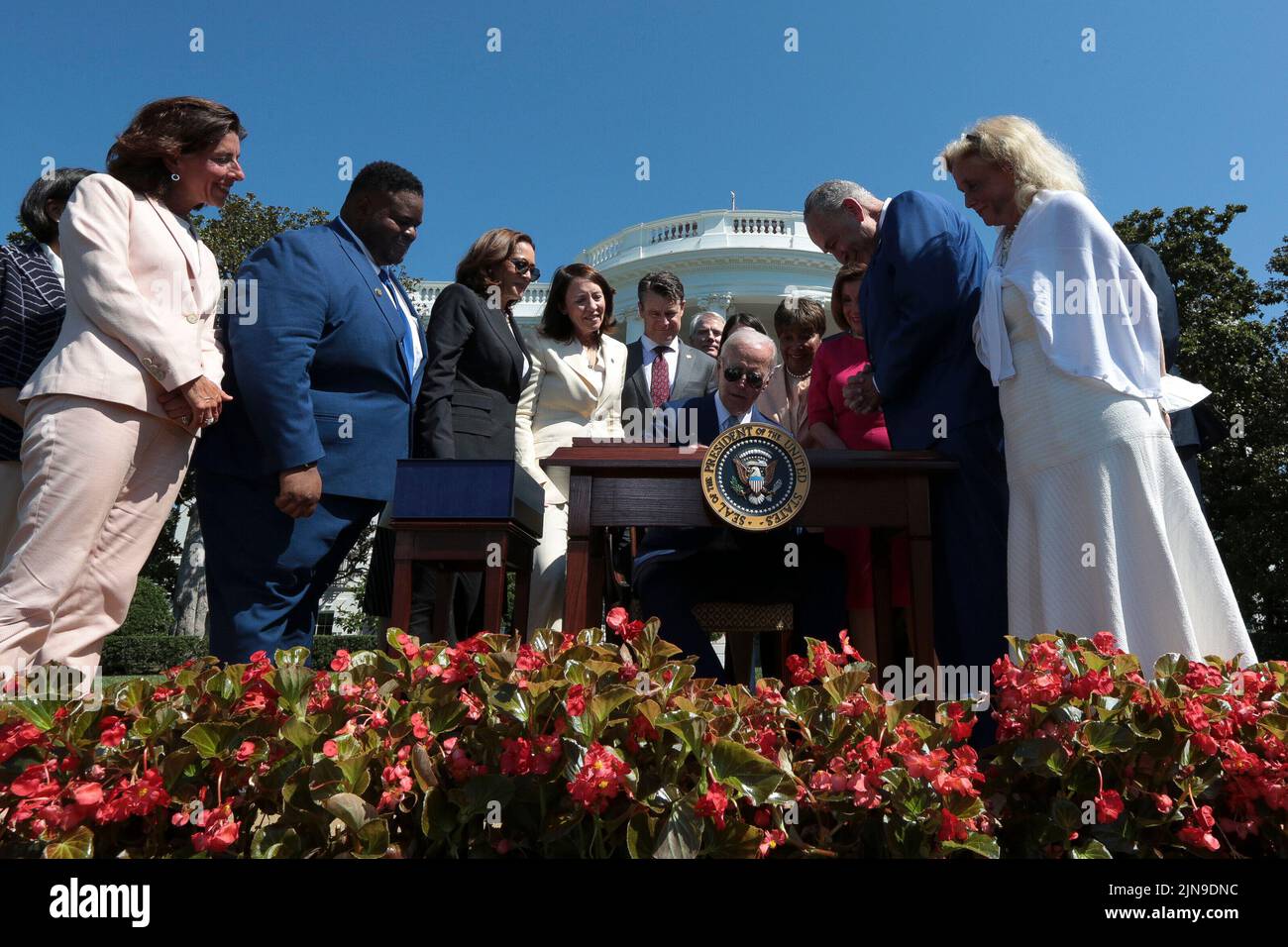 United States President Joe Biden signs into law H.R. 4346, the CHIPS