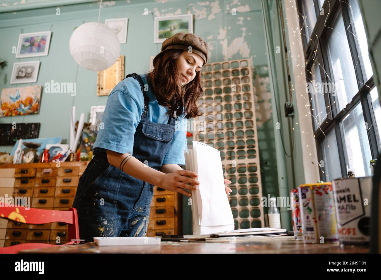 Woman in overall hi-res stock photography and images - Alamy