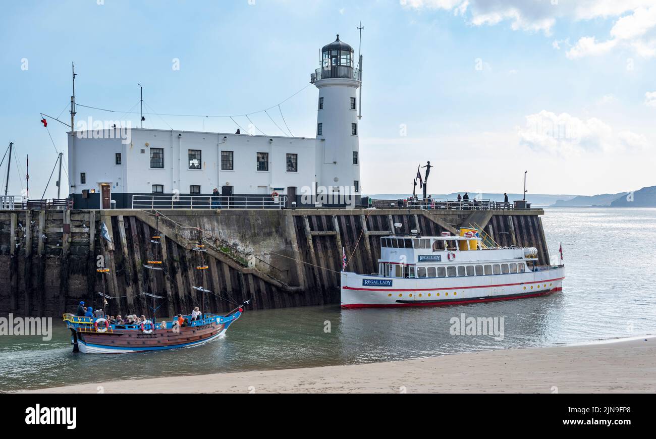 The Regal Lady pleasure steamer moored near the lighthouse at Scarborough Stock Photo
