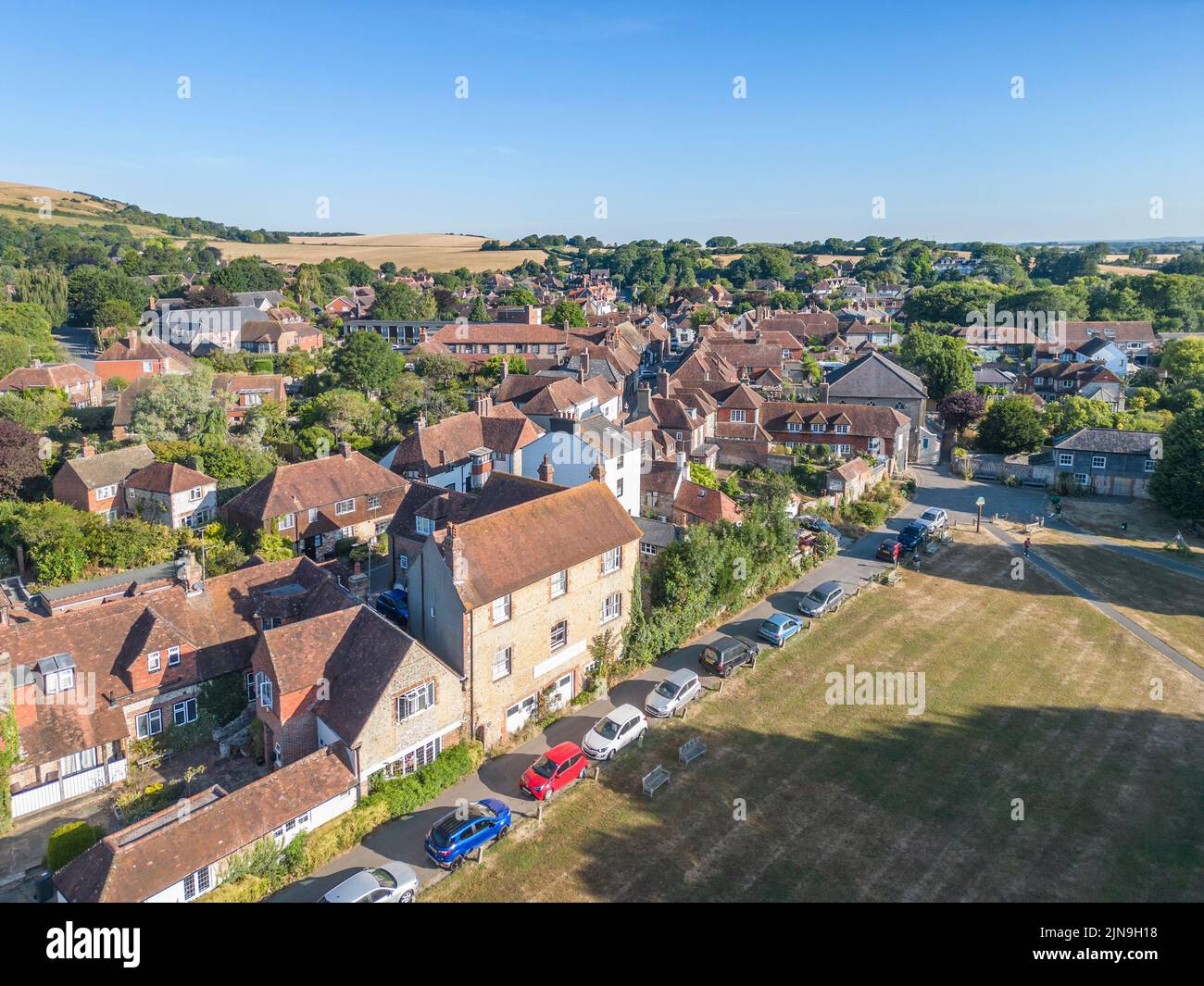 aerial view of the village of alfristonand the village green or tye  in east sussex in the sussex downs Stock Photo