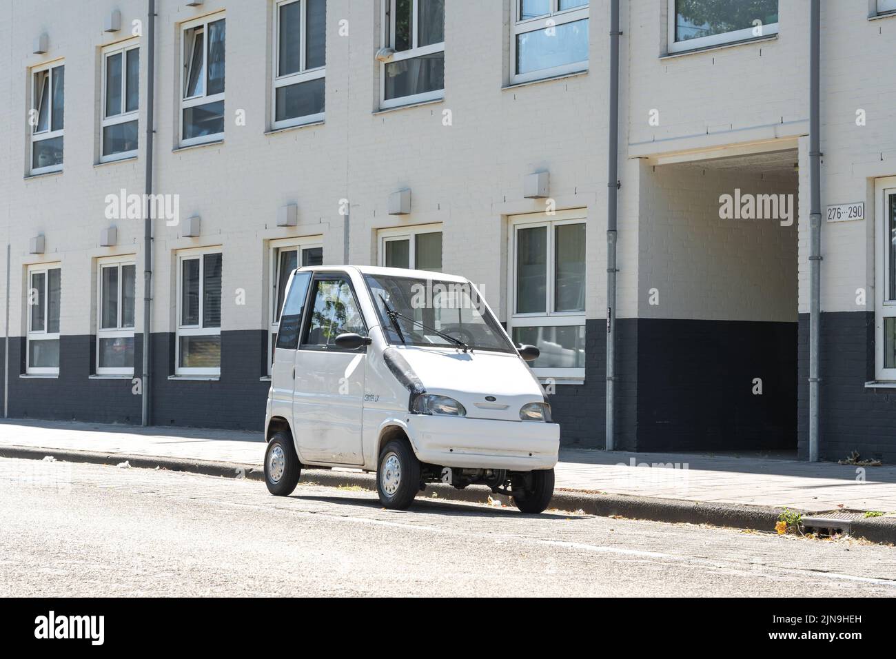 Amsterdam, The Netherlands, 10.08.2022, Dutch two-seat microcar Canta LX which was developed specifically for people with mobility restrictions parked Stock Photo