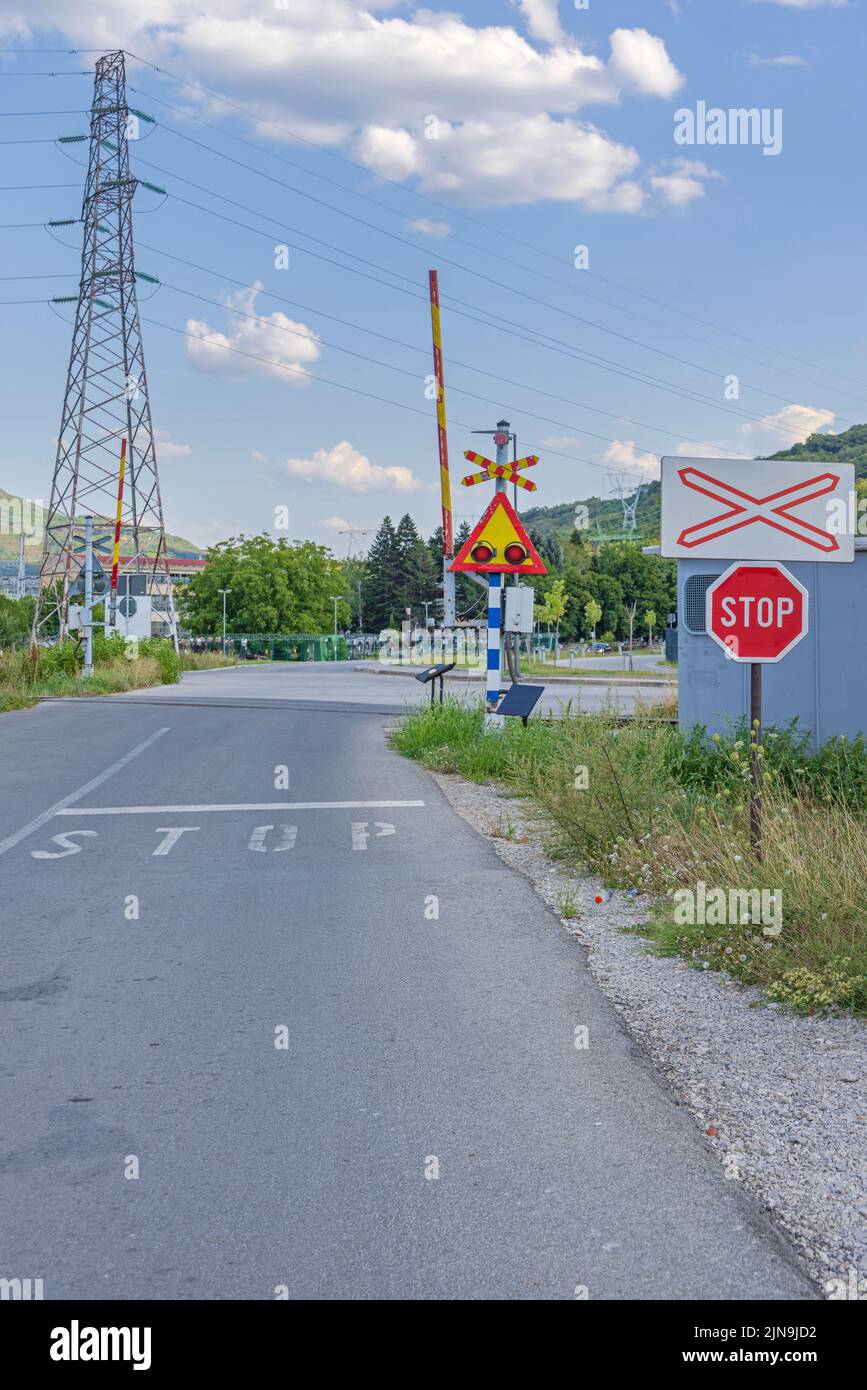 Railroad Crossing Stop Sign and Warning Lights Working Order Stock Photo