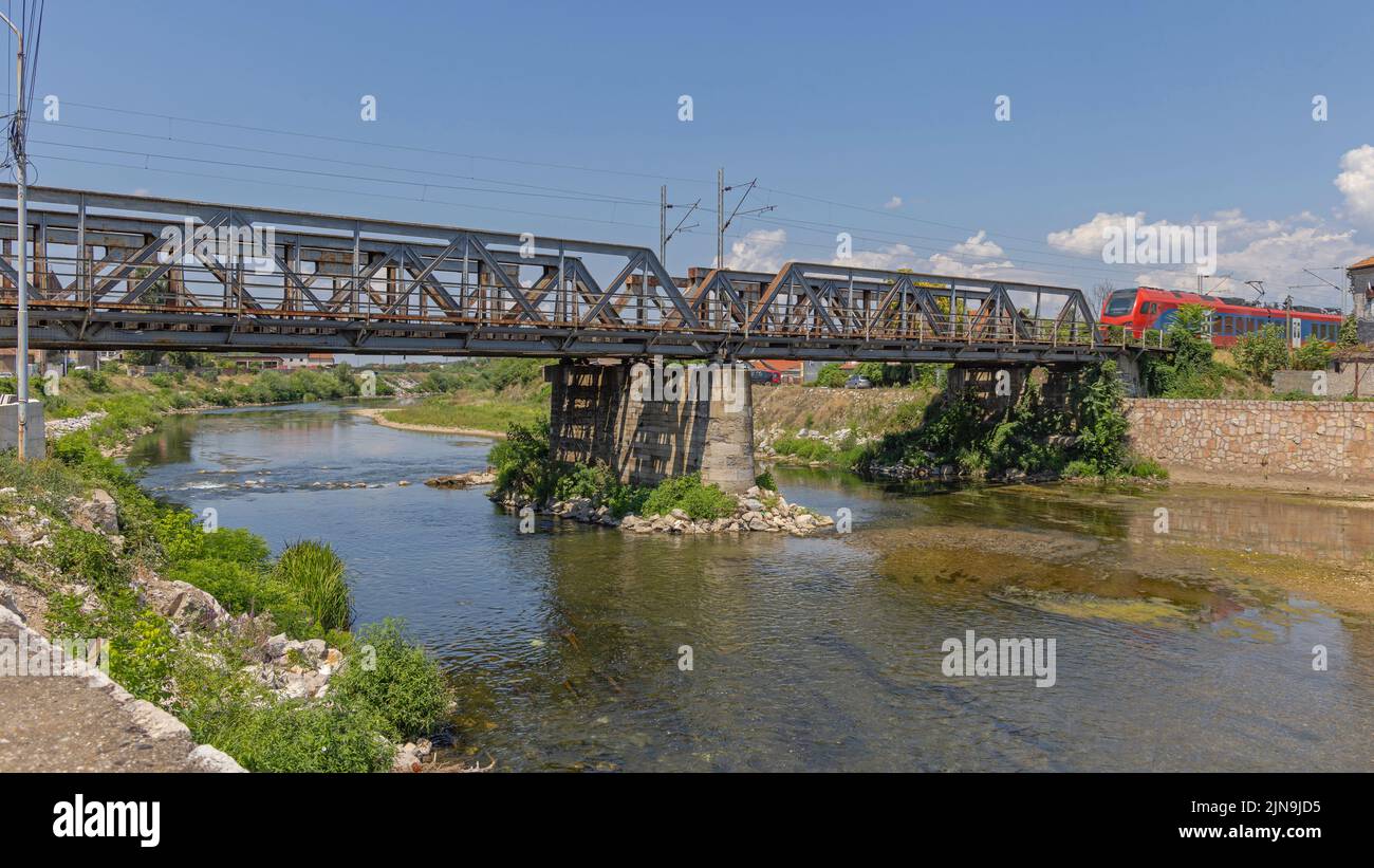 Old Iron Railway Bridge Over Nisava River at Hot Summer Day Stock Photo