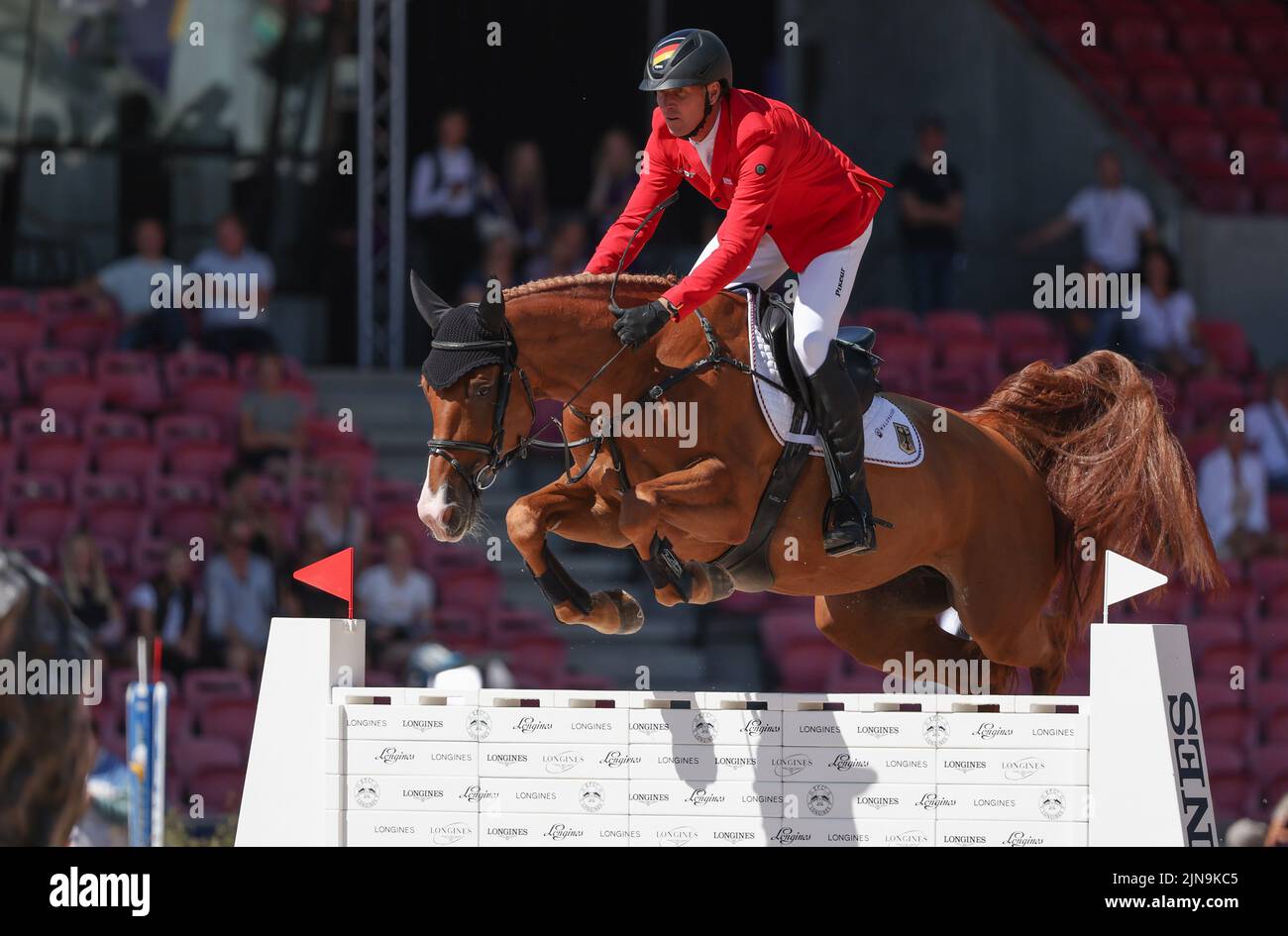 10 August 2022, Denmark, Herning: Equestrian sport: World Championship, Show Jumping. Show jumper Andre Thieme (Germany) rides DSP Chakaria. Photo: Friso Gentsch/dpa Stock Photo