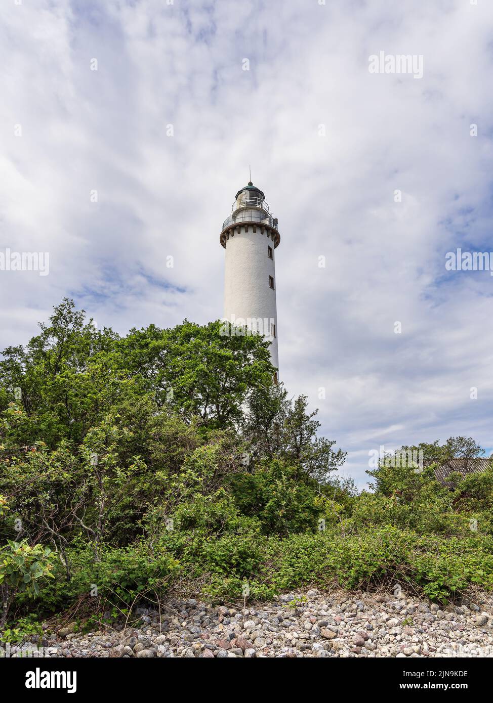 The lighthouse Långe Erik on shore of the Baltic Sea on the island Öland in Sweden. Stock Photo