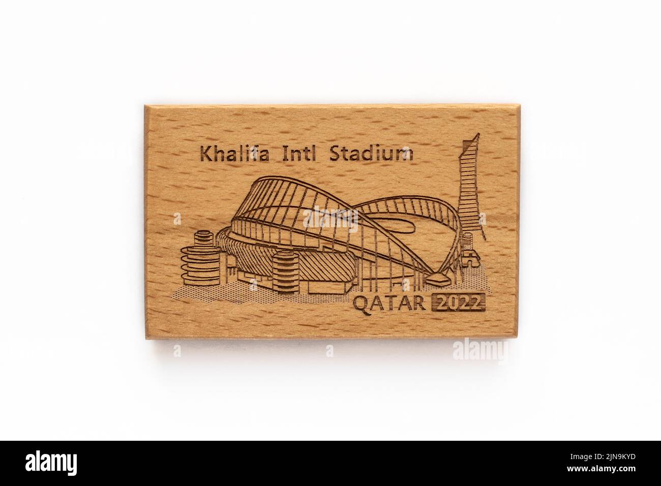 DOHA, QATAR - AUGUST 10, 2022: Khalifa International Stadium Qatar fridge magnet. Qatar will be hosting FIFA World Cup 2022. Stock Photo
