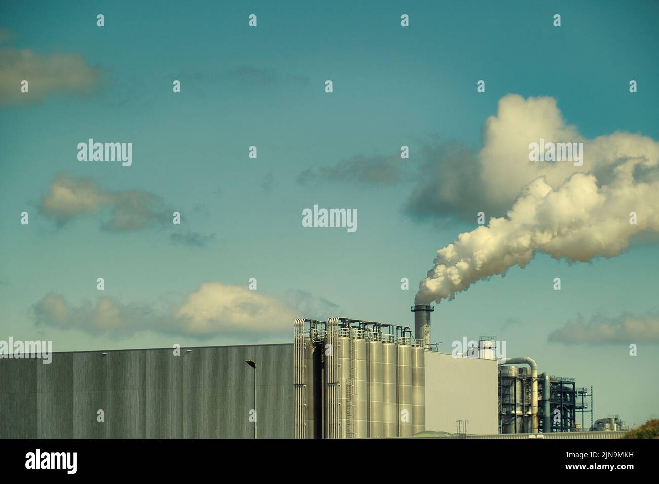A smoke coming out of a factory chimney the concept of air pollution