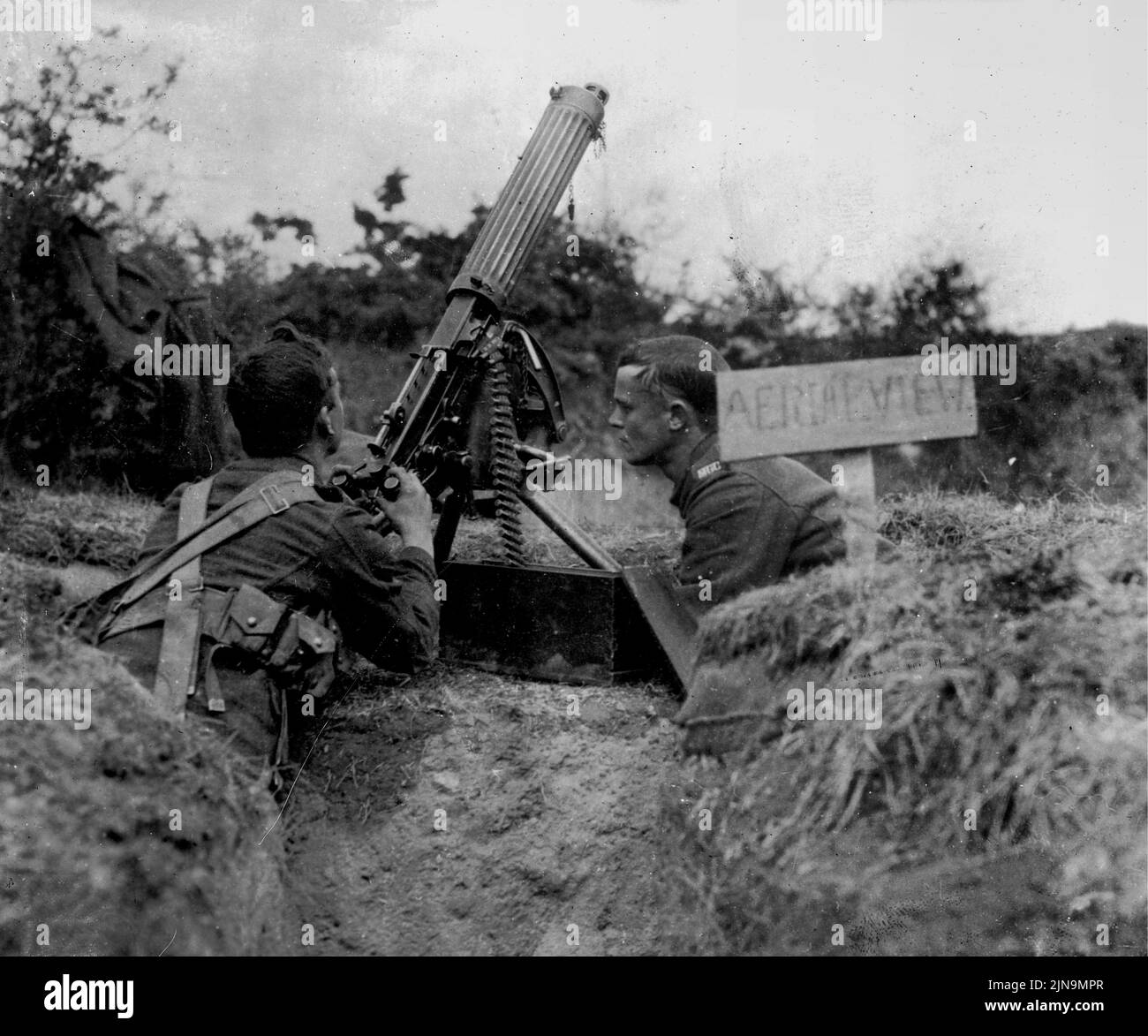 WESTERN FRONT, BELGIUM - circa 1916 - British soldiers man a Vickers machine gun position on the Western Front during World War I. Called 'Aerial View Stock Photo