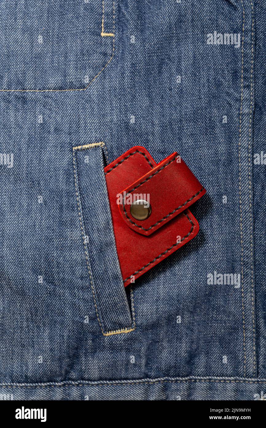 Luxury craft business card holder case made of leather. Red Leather box for cards in a pocket of