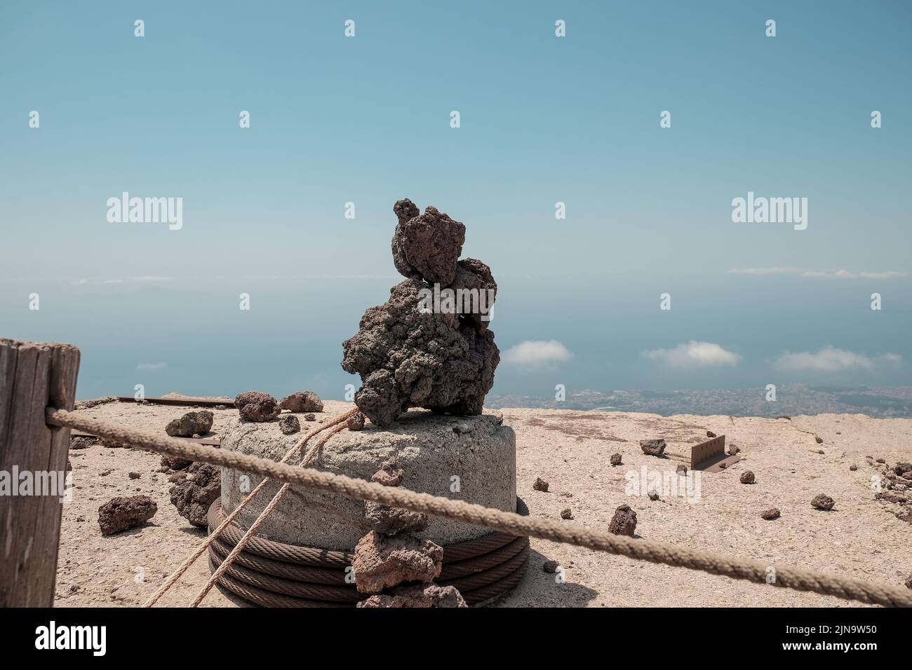 Small piles of volcanic rock made and left  by tourists on the top of Mount Vesuvius Italy. Stock Photo